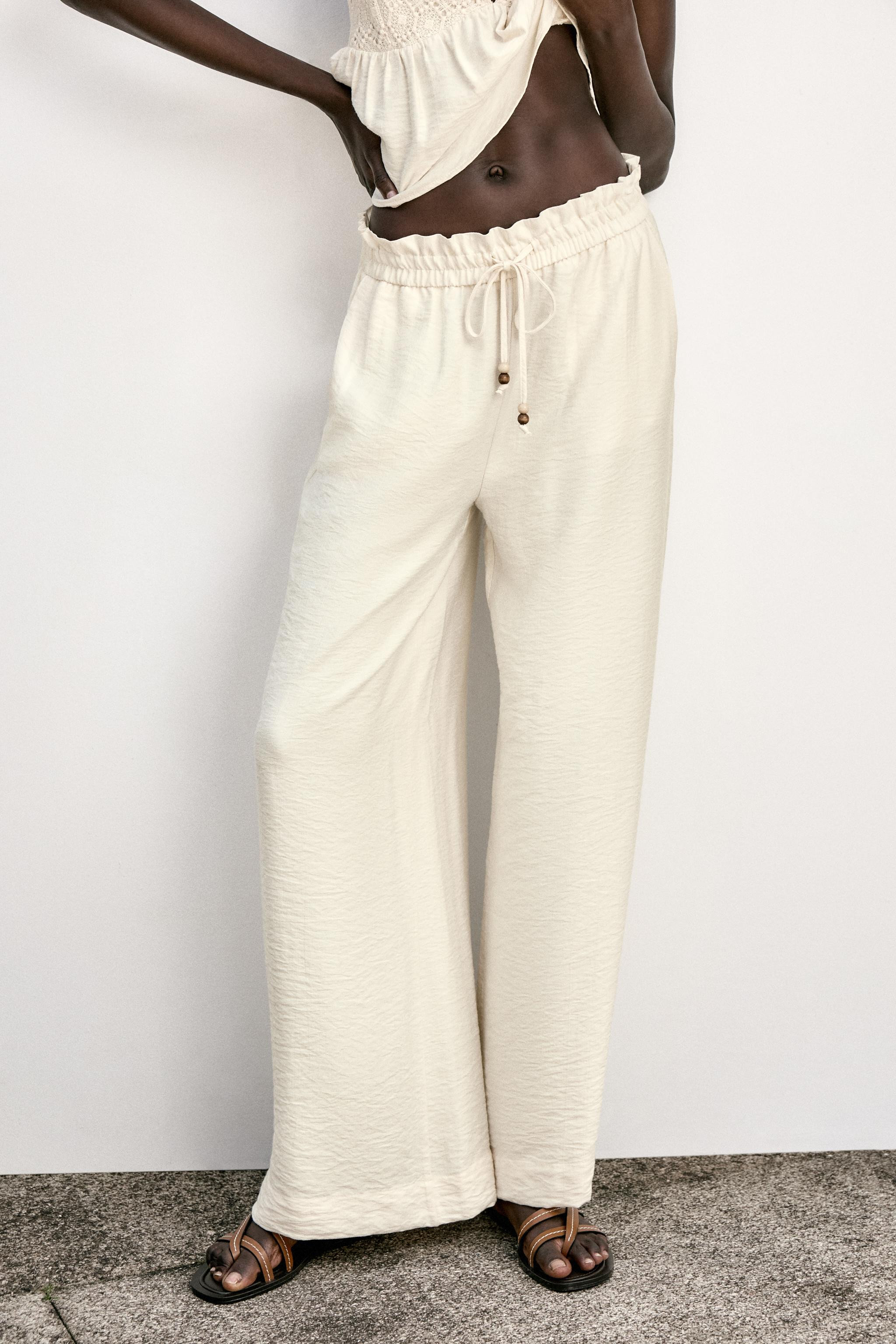 FLOWING WIDE-LEG TROUSERS | Zara UK