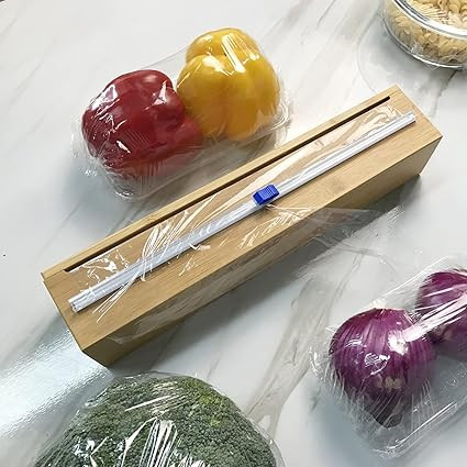 Plastic Wrap Dispenser, Bamboo Wood Cling Food Wrap Dispenser, with Slide Cutter & A Roll of 11.5... | Amazon (US)