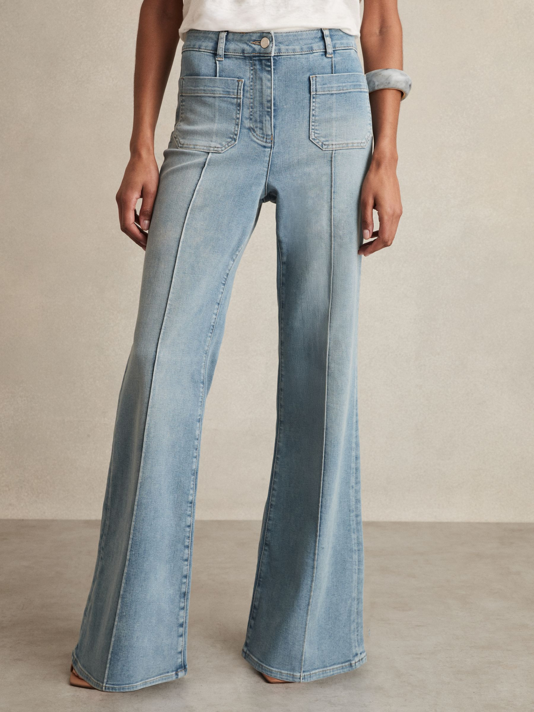 Petite Patch Pocket Flared Jeans in Light Blue | Reiss UK