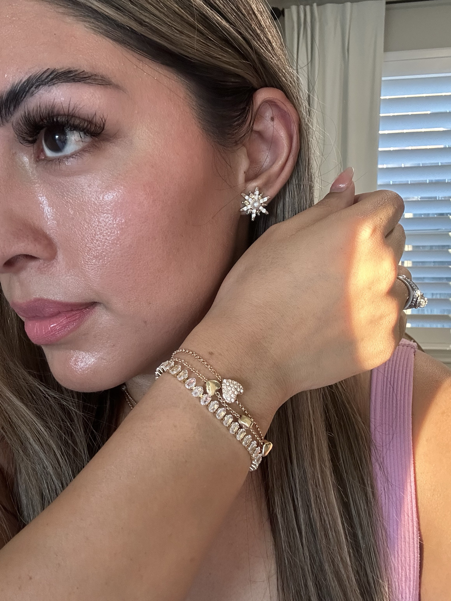 Paired this beautiful tennis bracelet with the heart bracelets. I absolutely love star earrings with the pearl. 

#LTKHoliday #LTKGiftGuide #LTKsalealert