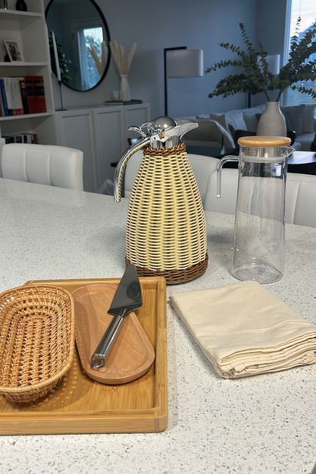 Table setting 
Table set
Rattan insulated kettle
Rattan kettle
Stainless steel cake spatula
Rattan tray 
Braided tray
Plastic water pot 
Water kettle
Wooden tray
Cloth napkin

#LTKunder50 #LTKhome #LTKfamily