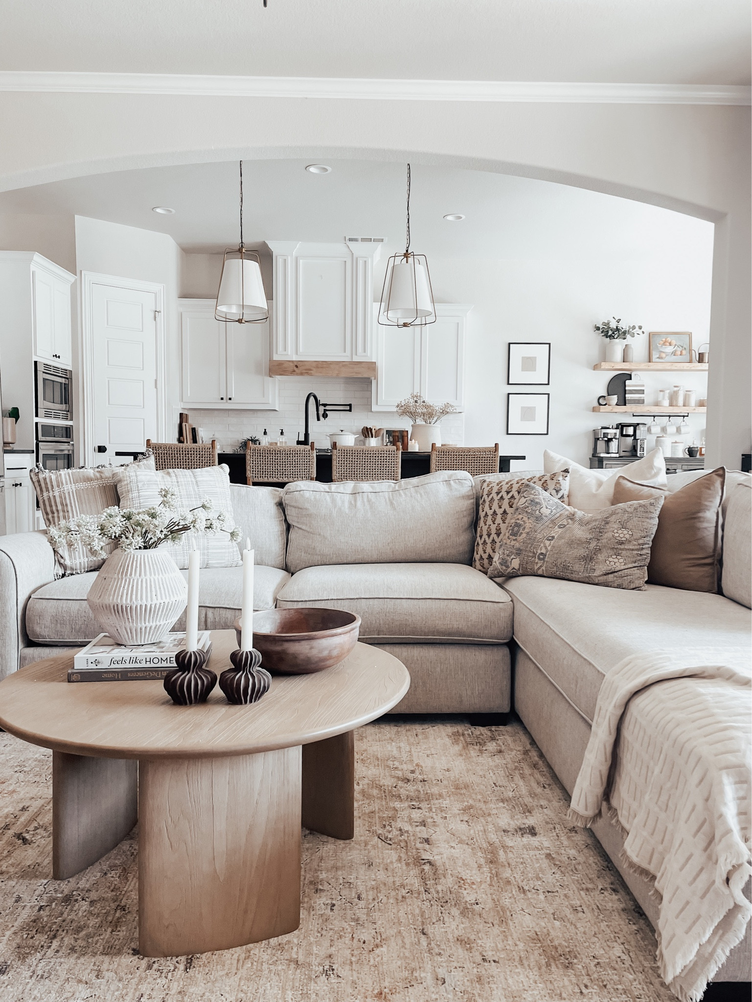 Living room inspiration, neutra home decor, round coffee table, world market home finds, H&M home finds, throw pillows, open concept living 

#LTKunder50 #LTKhome #LTKunder100