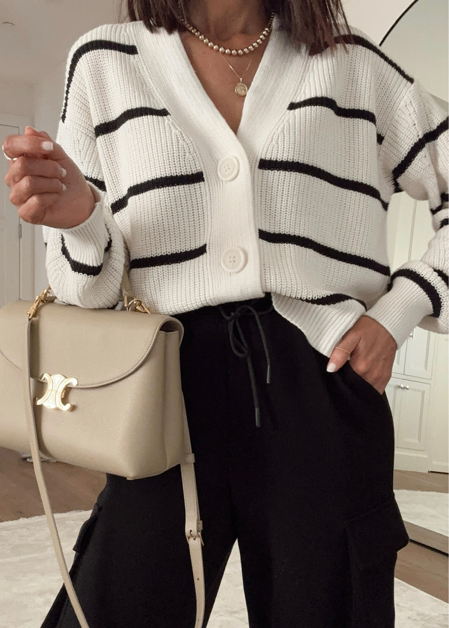 This target cardigan is so good and budget friendly! I'm just shy of 5/7" wearing a size small✨ #stylinbyaylin #aylin

#LTKSeasonal #LTKBeauty #LTKItBag