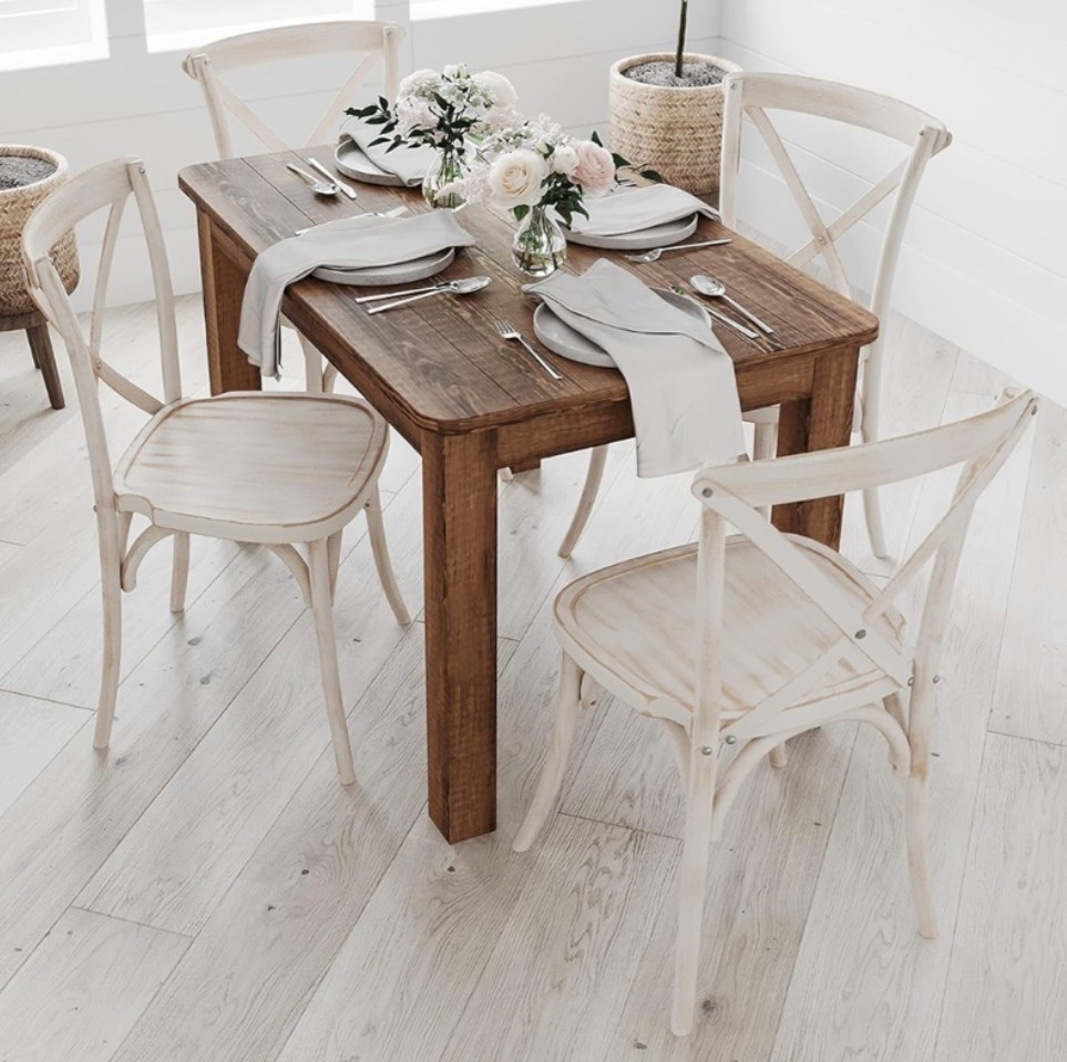 Rustic farmhouse dining table and X-back chairs with that warm gathered around the table feel that makes a dining space feel instantly more inviting. 🍅🐄🪿🤎 Perfect for farmhouse kitchens, dinner parties, holiday hosting, patio dining rooms, breakfast nooks, or slow family dinners when you want furniture that feels timeless, sturdy, and beautifully lived in. The solid pine table, antique rustic finish, lime wash chairs, and classic bistro shape give the whole setup that cozy countryside dining feel without looking overly formal. 

Add this dining set if your home needs a warm gathering space for hosting, meals, and everyday moments. 🍳🌿

#LTKfoodie #LTKHome #LTKOver40