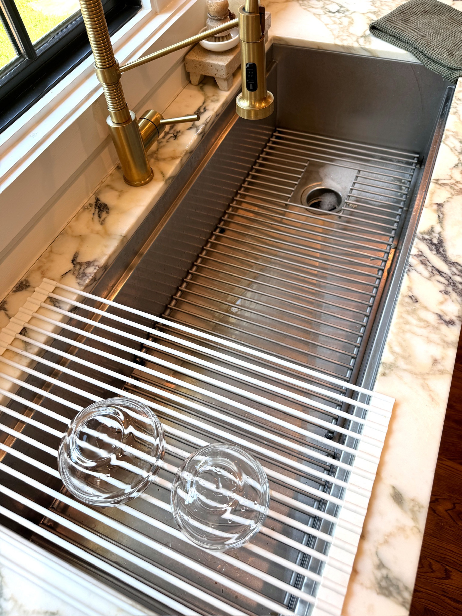 This roll up dish rack is one of my home must haves!! It’s a great Amazon find, i use it to dry over the sink and then roll it up when I’m done. Such a good deal 

#LTKFindsUnder50 #LTKHome