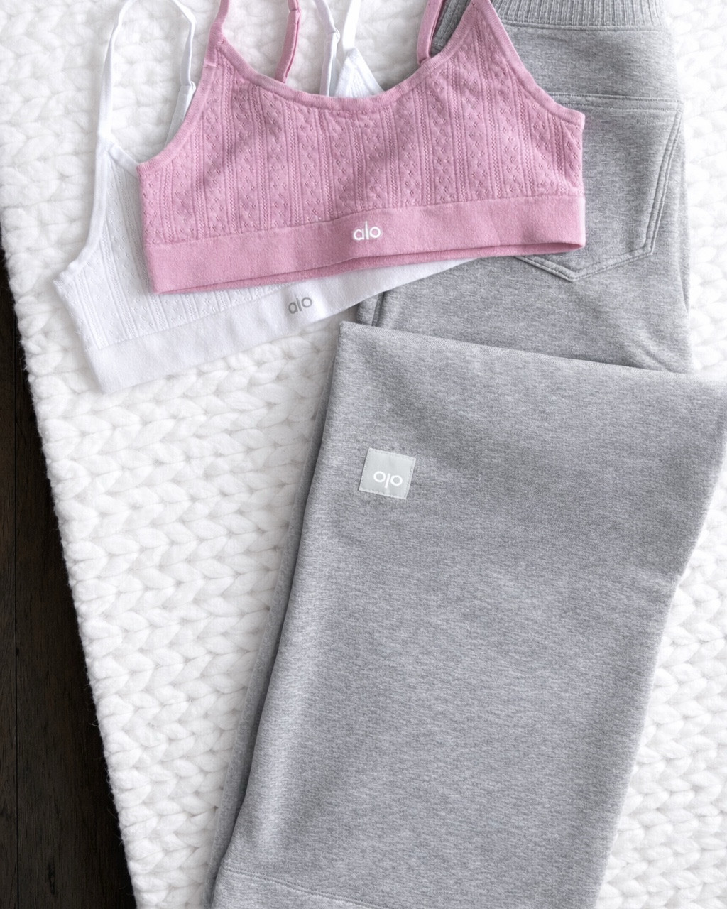 My latest alo haul — I loved the espresso color of these wide leg pants so much I immediately ordered the gray + the matching cropped top. The fit is so good. Flattering, easy to dress up, but still comfy. Also grabbed the cutest flirty pointelle bras in white & pink. All size small.

This is that effortless off duty, Pilates to coffee, cozy but pulled together uniform I live in.

alo yoga haul –  wide leg pants – gray lounge set – cropped sweatshirt – pointelle bralette – soft lounge wear – elevated athleisure – Pilates outfit – everyday activewear – neutral outfit inspo – clean girl style – minimal wardrobe – capsule closet staples – comfy chic outfit – travel day look – airport outfit – spring athleisure – women’s loungewear set – viral alo finds

#LTKActive #LTKValentine #LTKU