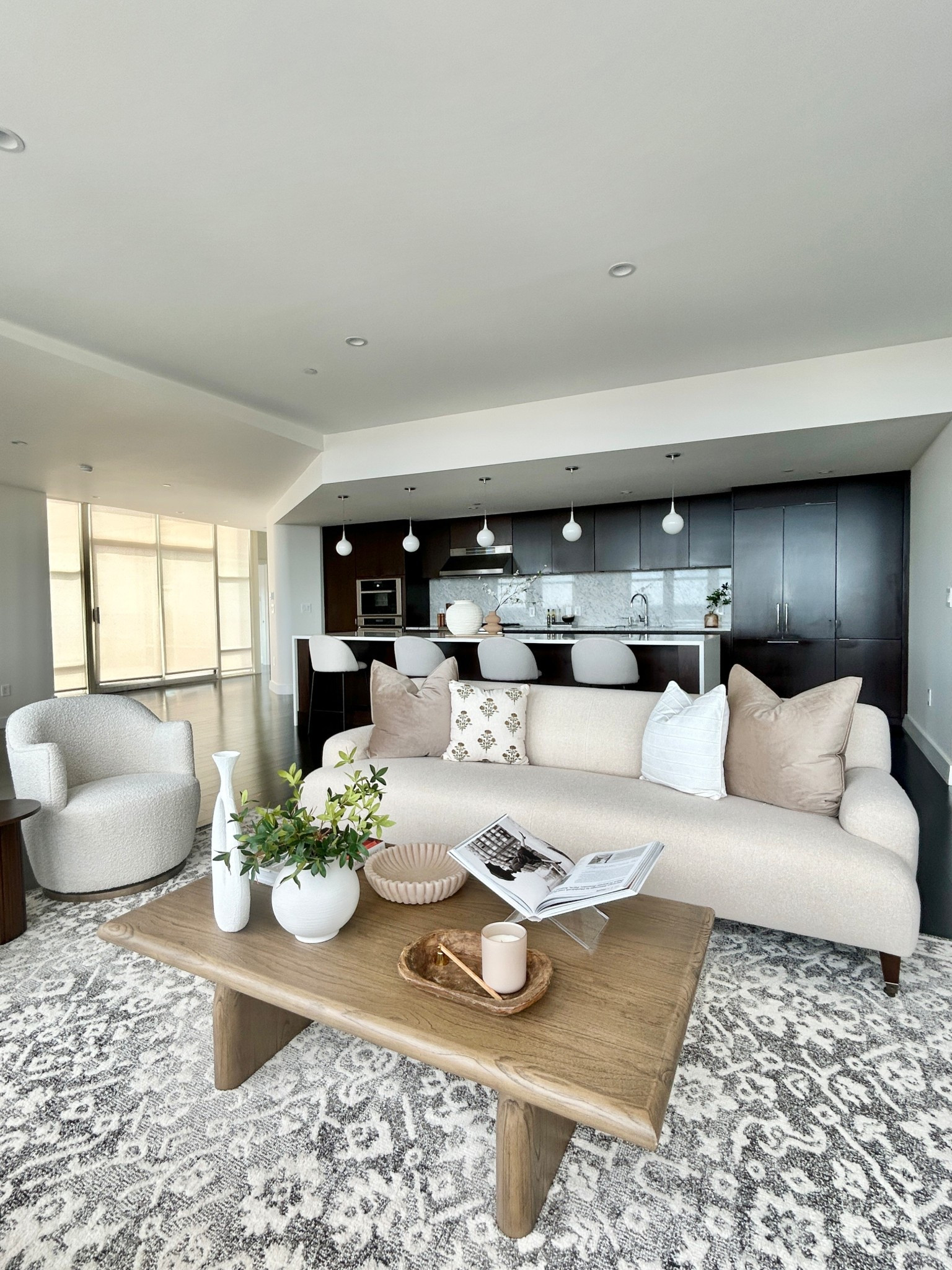 Cream sofa and wood rectangle coffee table. 

#livingroom #creamsofa #coffeetable

#LTKHome