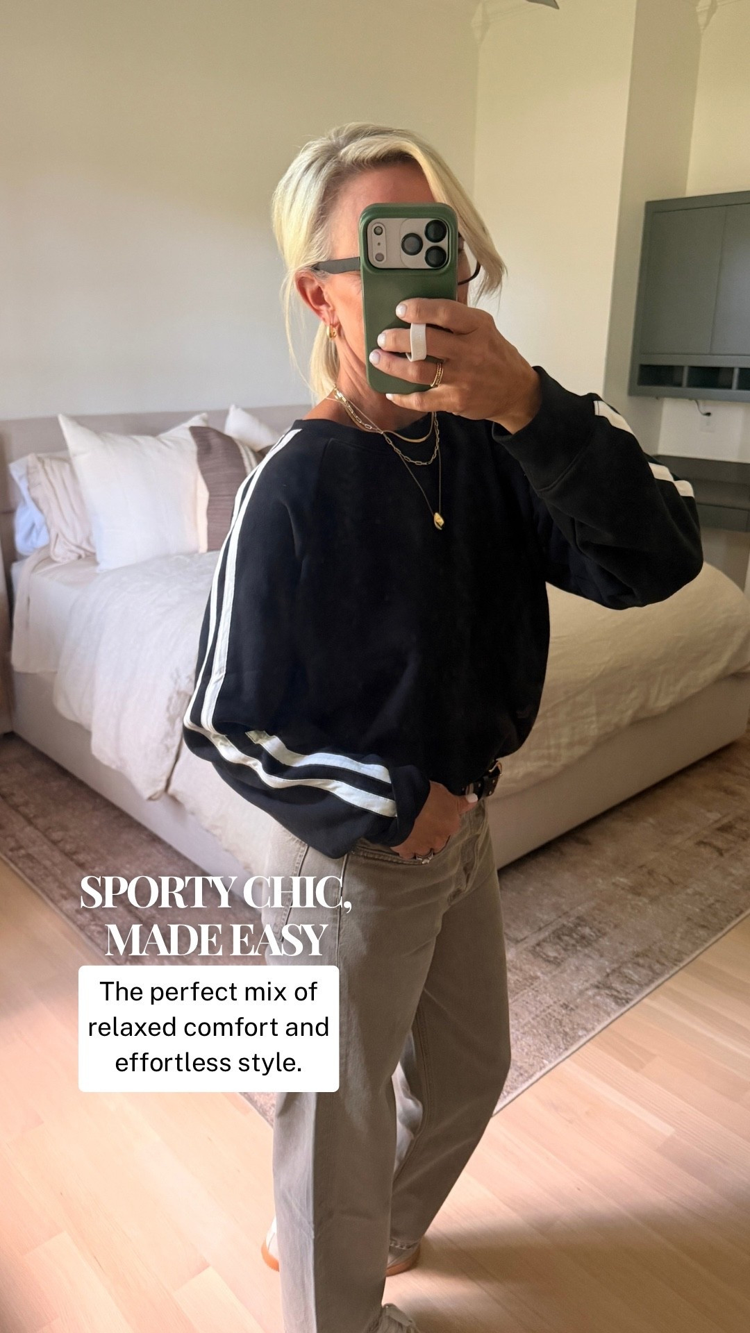 Sporty meets chic, and I love how easy this combination is! This sweatshirt with white stripe details pairs perfectly with relaxed jeans for a casual look that still feels pulled together. Add a few gold accessories, and you have an effortless everyday outfit.

#LTKootd #LTKOver40
