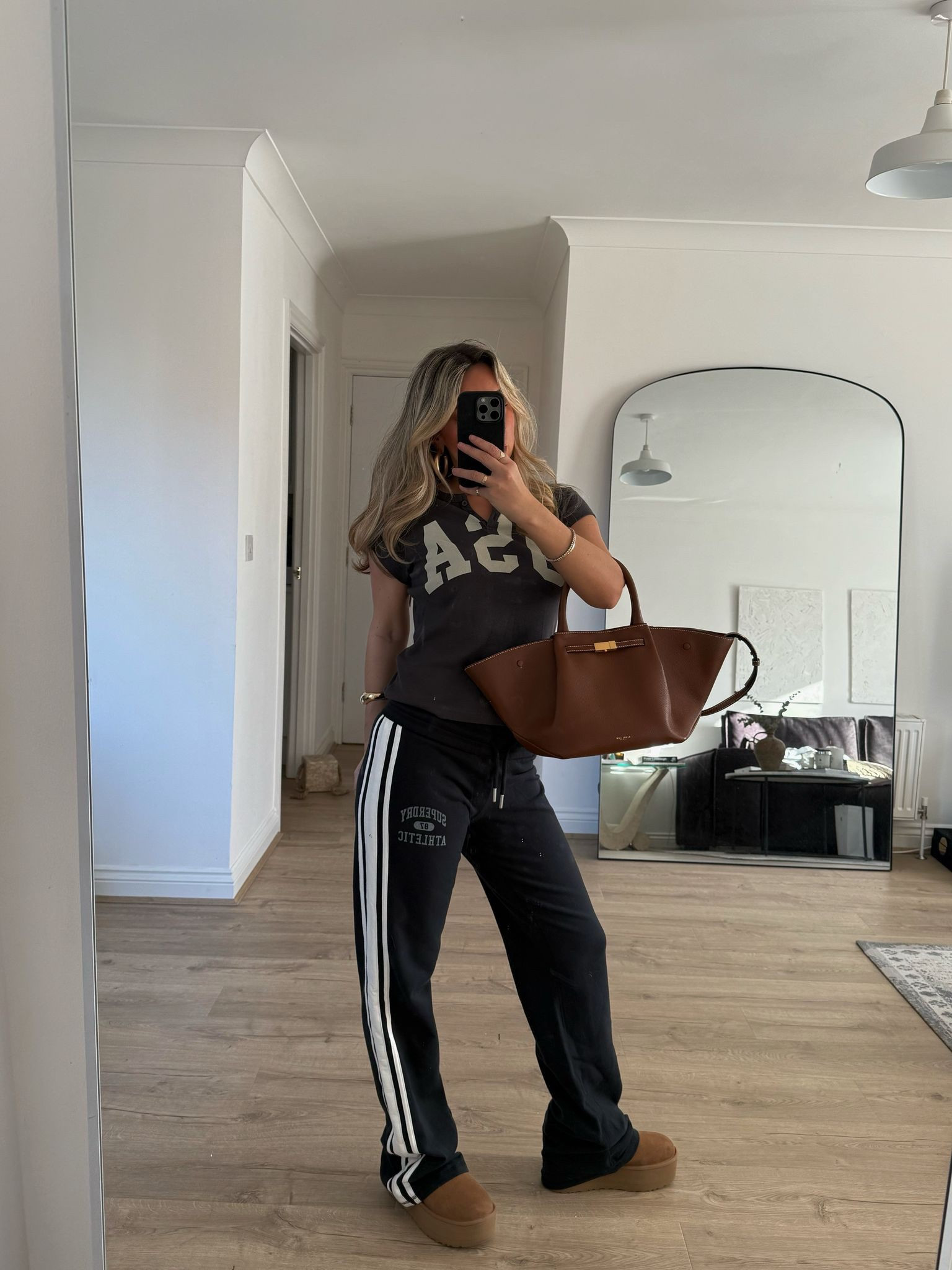 Superdry graphic tee, Superdry stripe track pants, Demellier brown leather handbag, platform Uggs 🤎

Casual style, casual outfit, athleisure, spring style, spring outfitt

#LTKspring #LTKeurope #LTKuk