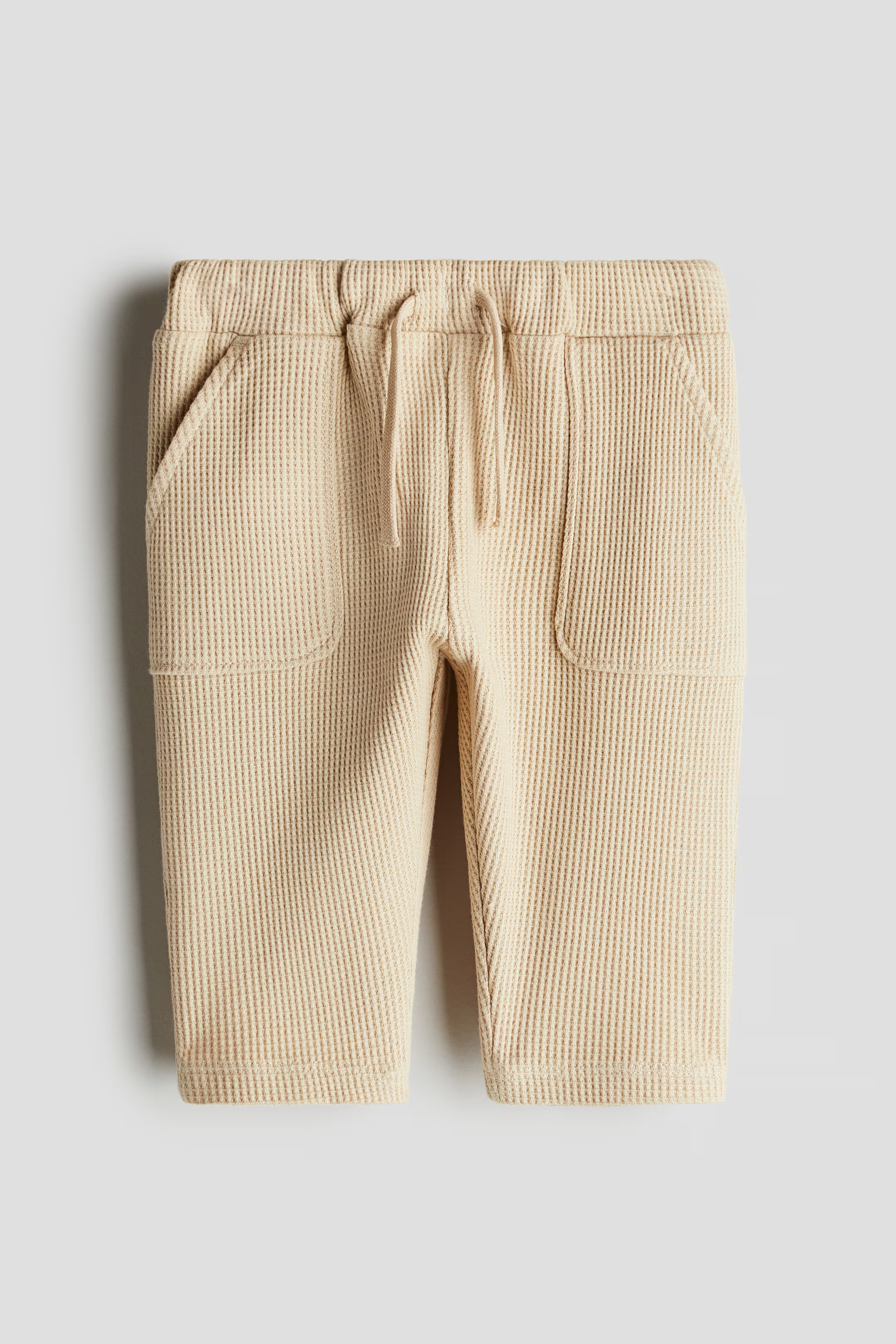 Pantalon jogger en coton gaufré - Beige - ENFANT | H&M FR | H&M (FR, IT, ES, PT, BE)