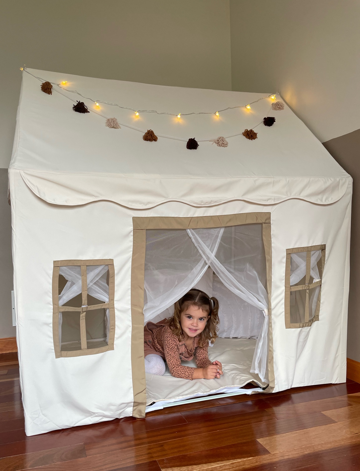 The sweetest indoor / outdoor playhouse. Comes WITH the lights & Pom poms 🥰

#LTKunder100 #LTKkids #LTKfamily
