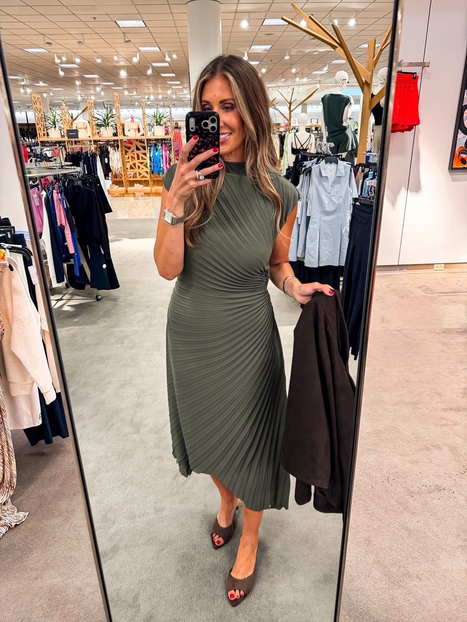 This pleated midi dress is such a flattering silhouette. The olive green color feels timeless, the draping defines the waist beautifully, and the pleated skirt gives it gorgeous movement. It’s an easy choice for weddings, cocktail parties, or any event where you want to feel effortlessly put together.

Size M

pleated midi dress, olive green dress, wedding guest dress, cocktail dress, special occasion outfit, elegant style, fall wedding guest, Nordstrom fashion, timeless wardrobe, TheMomInStyle

#LTKootd #LTKWedding #LTKSeasonal