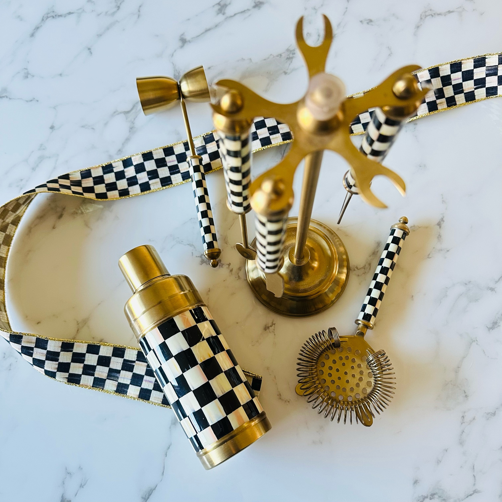 The perfect bar set for all your holiday entertaining this season! This limited edition set comes with the tools, stand and the shake! Classic courtly check print is timeless and trendy at the same time. Use discount code MCHOLIDAY20 

#LTKhome #LTKSeasonal #LTKHoliday