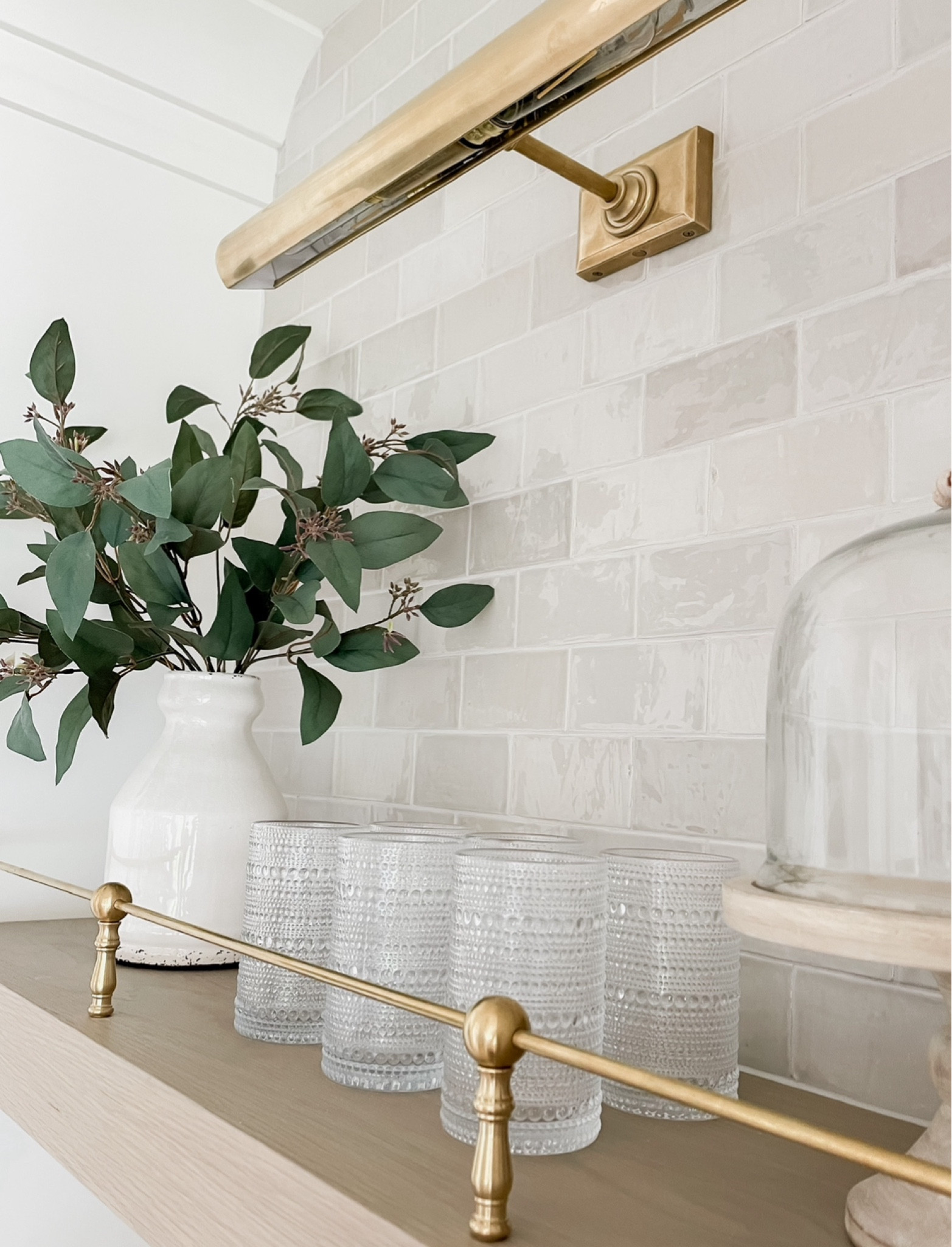 A classic way to style open shelving. These glasses are cute and functional. 

#LTKHome