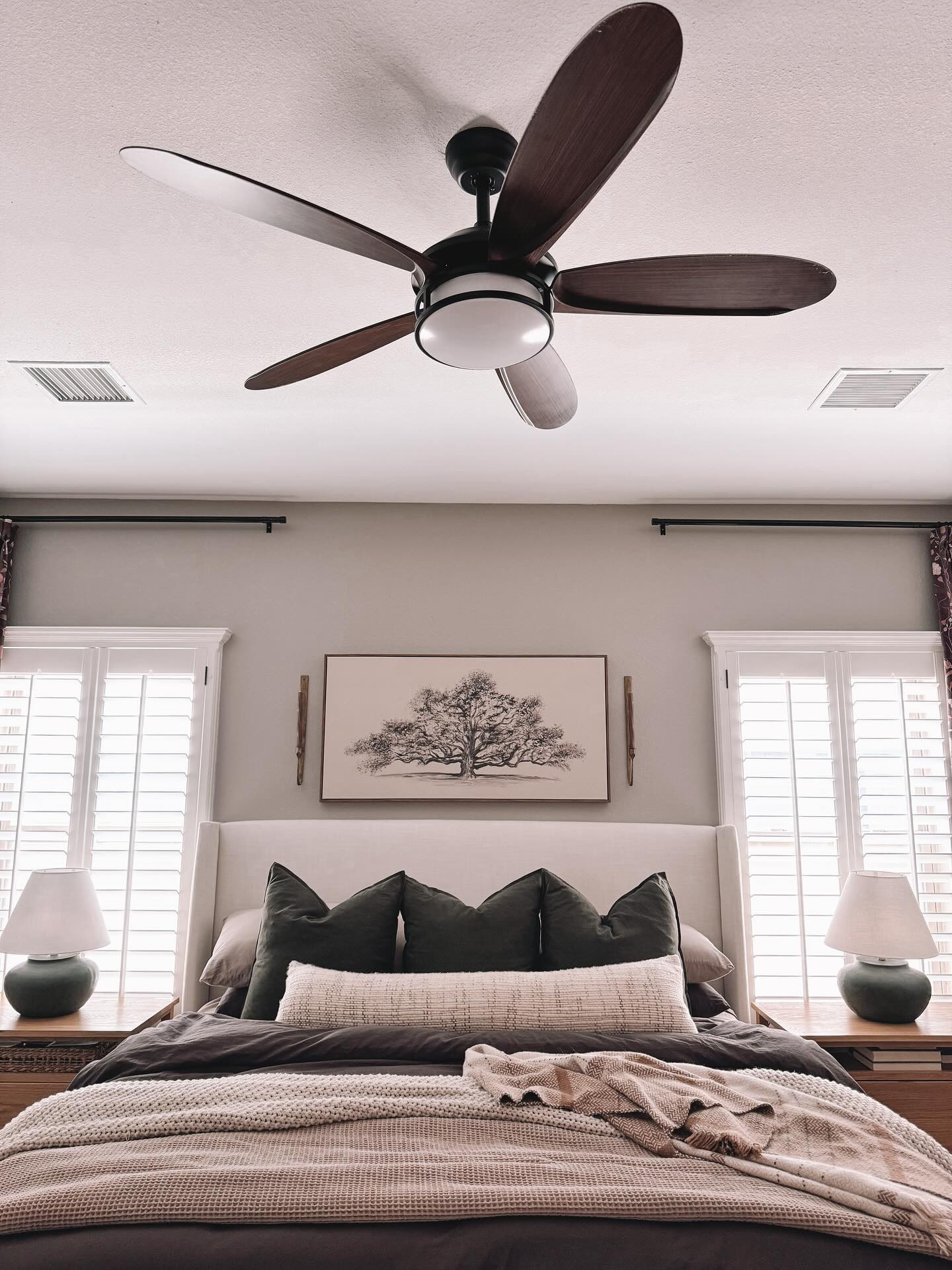 I spent some time yesterday cleaning and decorating our bedroom and figured I’d document it before I end up with a pile of clutter on the chair again, lol. It seems to be the dump zone before finding a more suitable spot for anything. Anyone else have one of those? 

Our fan from @hernest_official has been such a great upgrade. It’s so quiet and has 6 different speeds and 3 light settings! 

Sheets set and waffle blanket are from my favorite bedding company @bollandbranch 

I also moved my beautiful mirror from @mobilifiver from the entryway to our bedroom to fill that empty space. 

The coziest wool rug is from @revival and the pups love hanging out on it. 

You can find links to all of these items plus more in my bio! 

#homedesign #homestyle #homedecorating #homedecor #cozyhomedecor #cozyhomevibes #masterbedroom #primarybedroom #neutralhomedecor #fallhomedecor