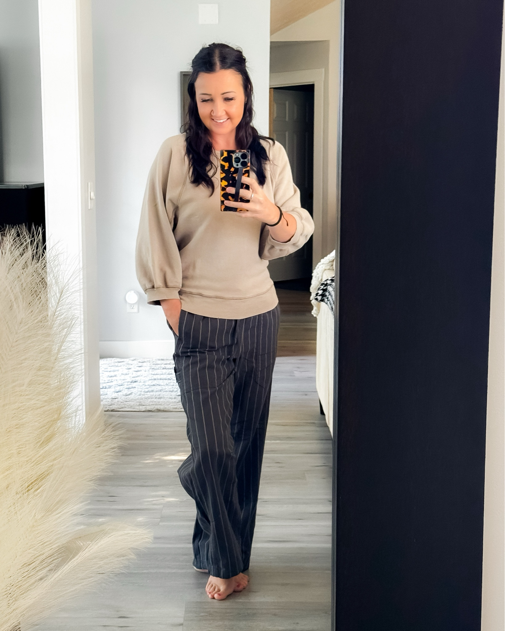 Easy, neutral, and pulled-together. This Aerie outfit does it all.

The tailored black and tan striped work pants bring a polished, elevated vibe with their straight-leg cut and flattering fit. Balanced with a soft 3/4 sleeve sweatshirt, the look stays comfortable while still looking put together. The mix of neutrals keeps it versatile and easy to accessorize—whether you’re pairing it with sneakers for a casual day or loafers for a more professional finish.
Work Pants size XS
Sweatshirt sized up to a Medium for a more relaxed fit.

Work To Weekend • Neutral Outfit • Casual Chic • Aerie Style • Everyday Looks • Comfort Meets Chic • Fall Style • Fall Neutrals • Fall Style • Striped Work Pants • Womens Fashion • Femme Sweatshirt

#LTKOver40 #LTKFindsUnder100 #LTKStyleTip