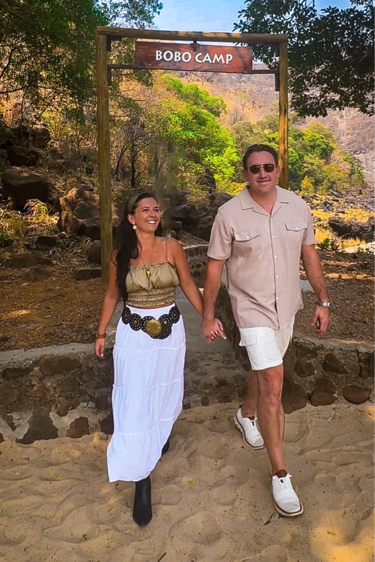 Men’s outfit: 
Cargo shorts TTS wearing XL 
Bright white, drawstring waist

Women’s outfit:
Skirt TTS wearing a small, elastic waistline 
Belt one size 
Boot TTS 7.5 