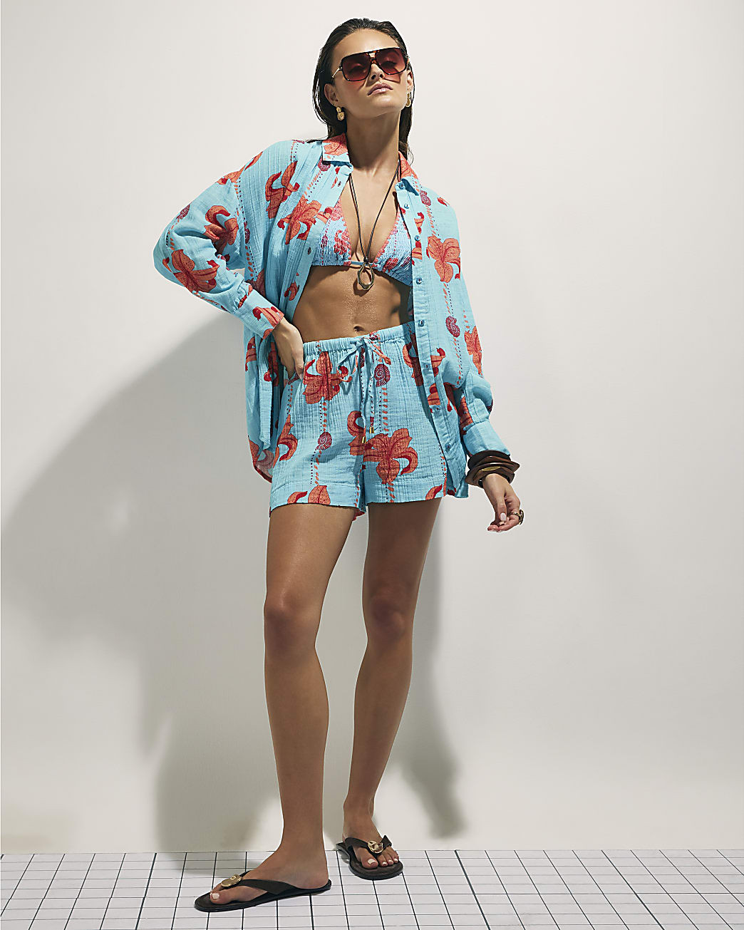 Blue Palm Print Beach Shorts | River Island UK & IE