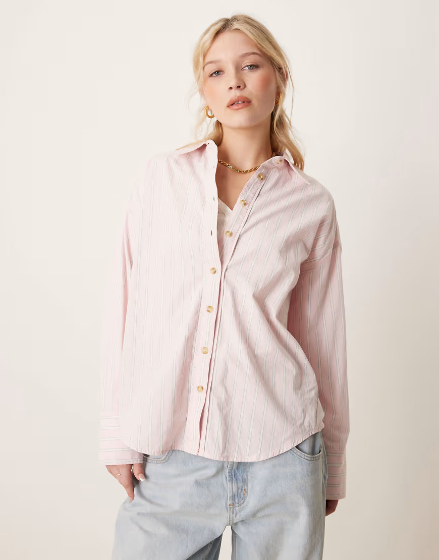 Free People striped varsity oversized shirt in light pink | ASOS (Global)