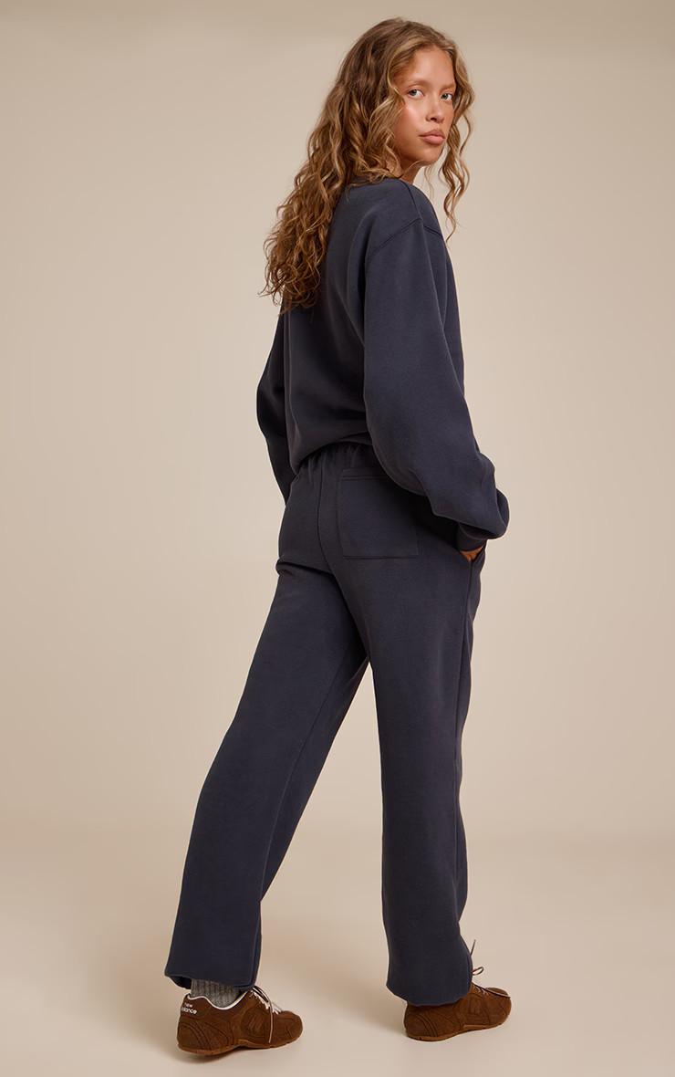 Navy PLT Embroidered Fleece Cuffed Sweat Pants | Athleisure | PrettyLittleThing IE