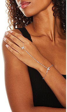 Lili Claspe Flora Hand Chain in Yellow Gold from Revolve.com | Revolve Clothing (Global)