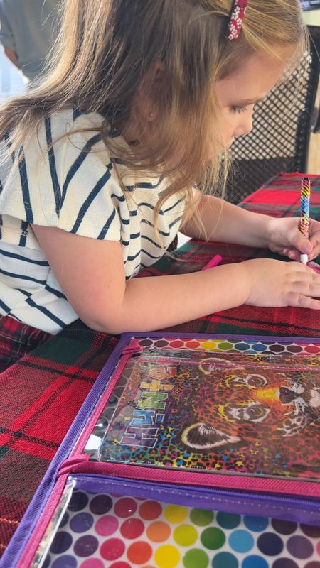 Loved the nostalgia this Lisa Frank Trapper Keeper and Activity set brought. It’s got stickers, coloring pad, crayons and a puzzle. It folds all up and has handles. Perfect for long car rides with kids or plane rides  

#LTKfamily #LTKkids #LTKVideo
