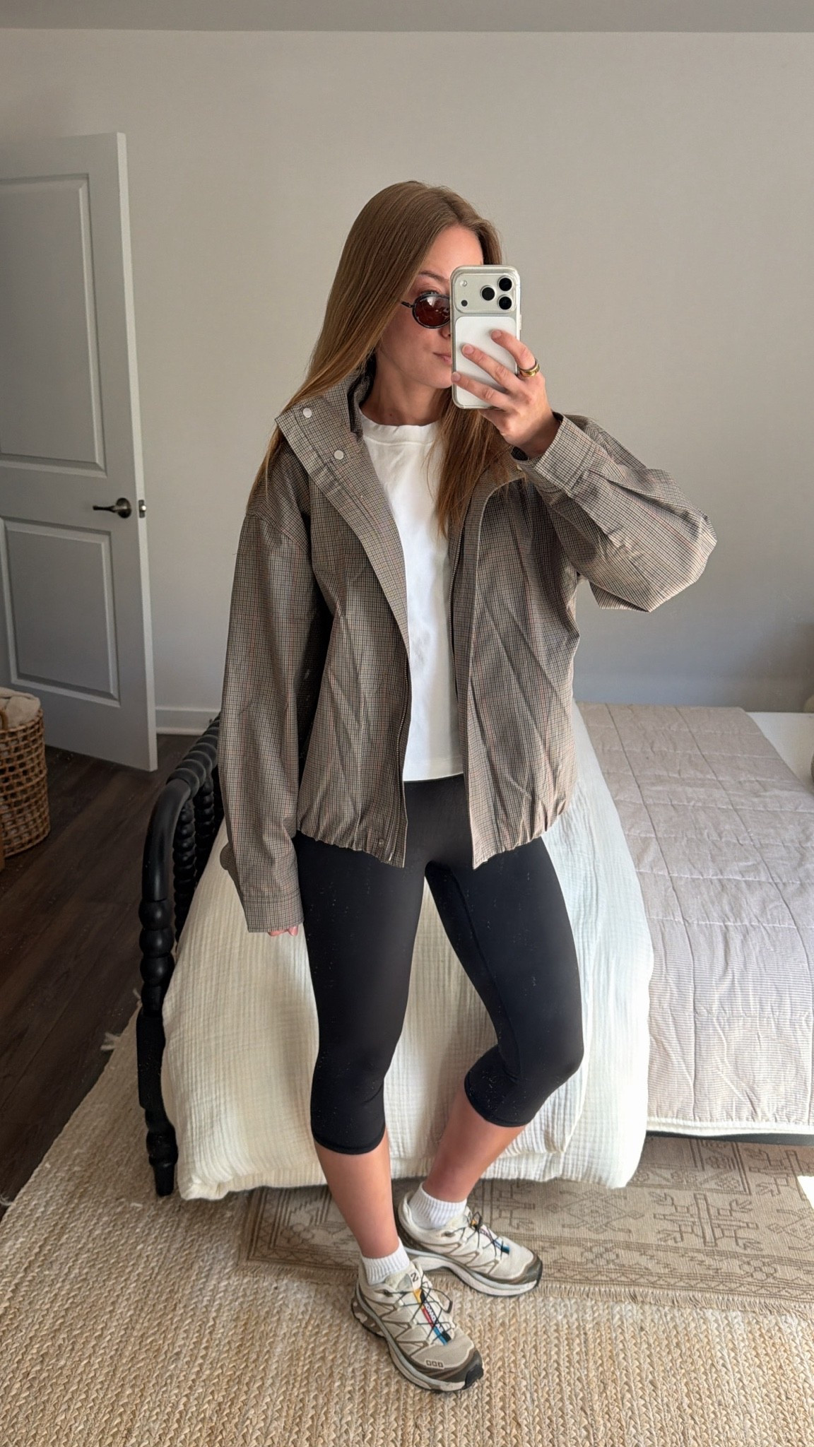 10/1/26 Casual Fall Outfit of the Day 🍂

An easy, casual fall outfit for a chill day 🍂 Wearing my @Aritzia plaid bomber jacket (M) over a basic white Aritzia tee with Amazon capri leggings + socks.

Finished with my Salomon sneakers + Amazon sunglasses. Comfy, slightly sporty + perfect for an everyday fall outfit 🤎

#LTKootd #LTKSeasonal