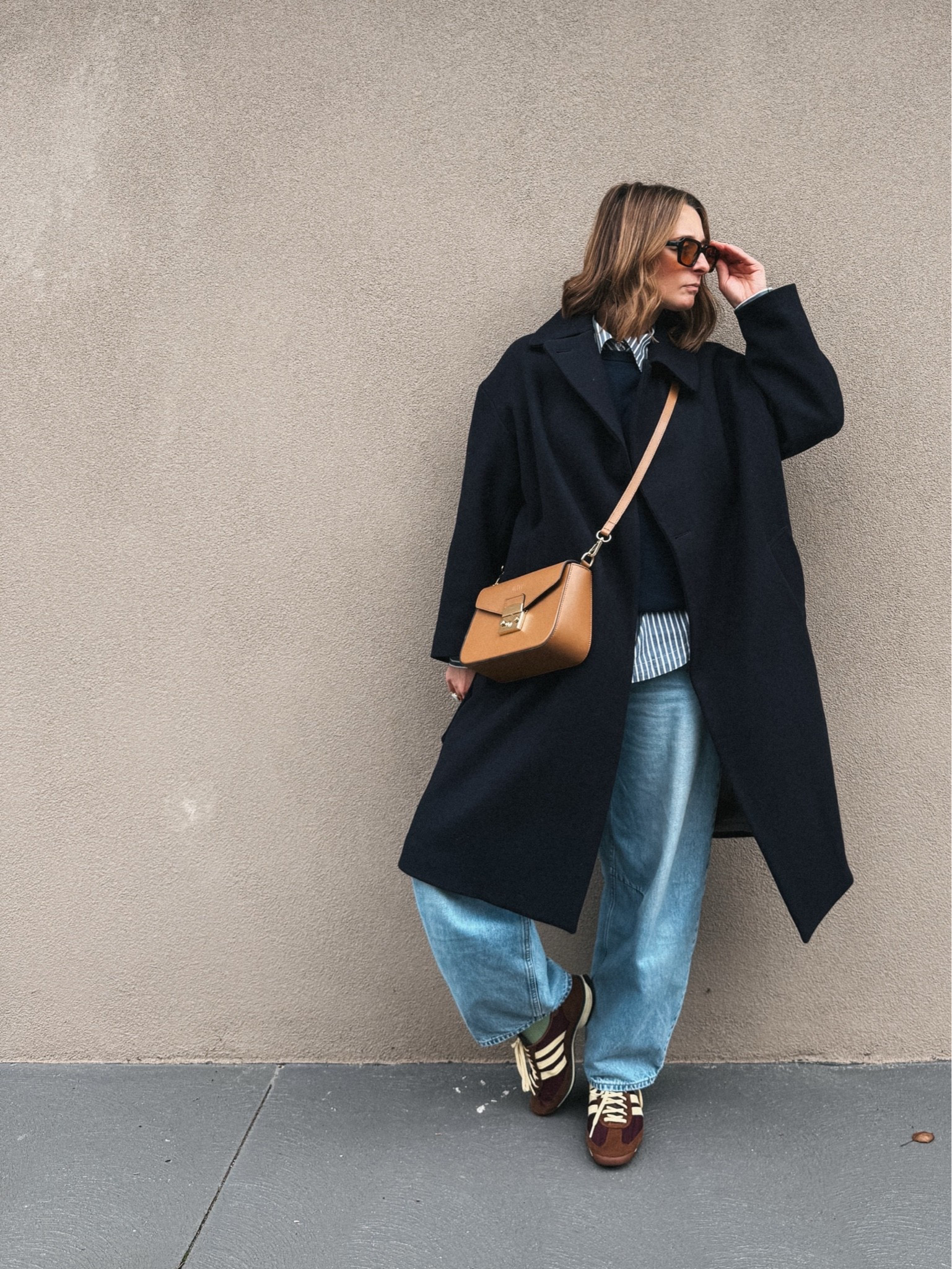 Coat - Gloverall (last season) 
Shirt - Jac &. Mooki. Wearing my usual small
Sweater - Uniqlo. Sized up to a
Medium
Jeans - Assembly Label. Wearing my usual 26
Sneakers - Adidas. Sized up half size

#LTKuk #LTKstyletip #LTKshoes