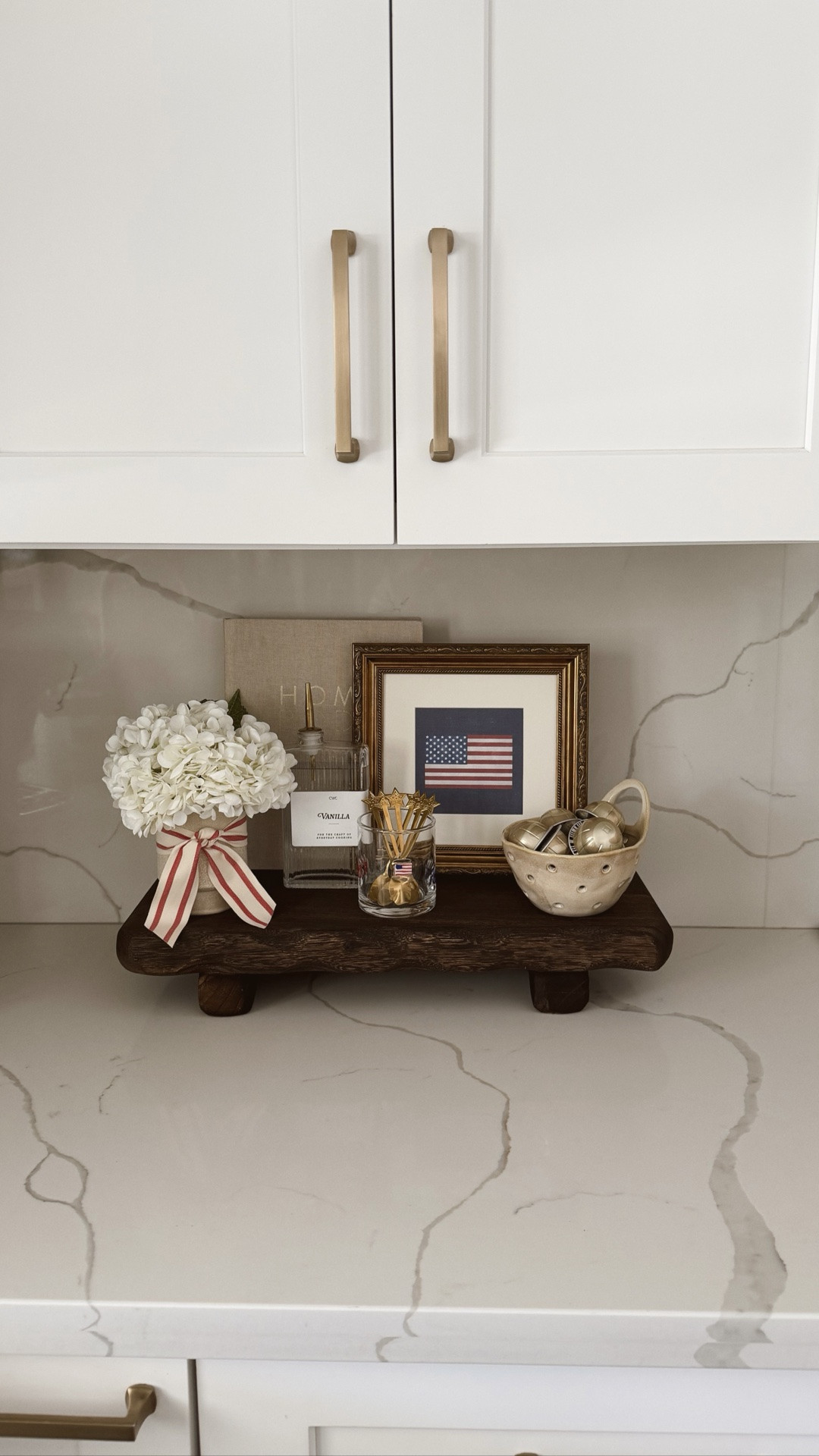 Vintage Americana coffee bar 🤍🇺🇸

#coffeebar #americanadecor #summer #summerdecor #flagprint #etsy #homedecor #kitchendecor #vintageframe #hydrangeas #iconcup #riser

#LTKHome #LTKSeasonal