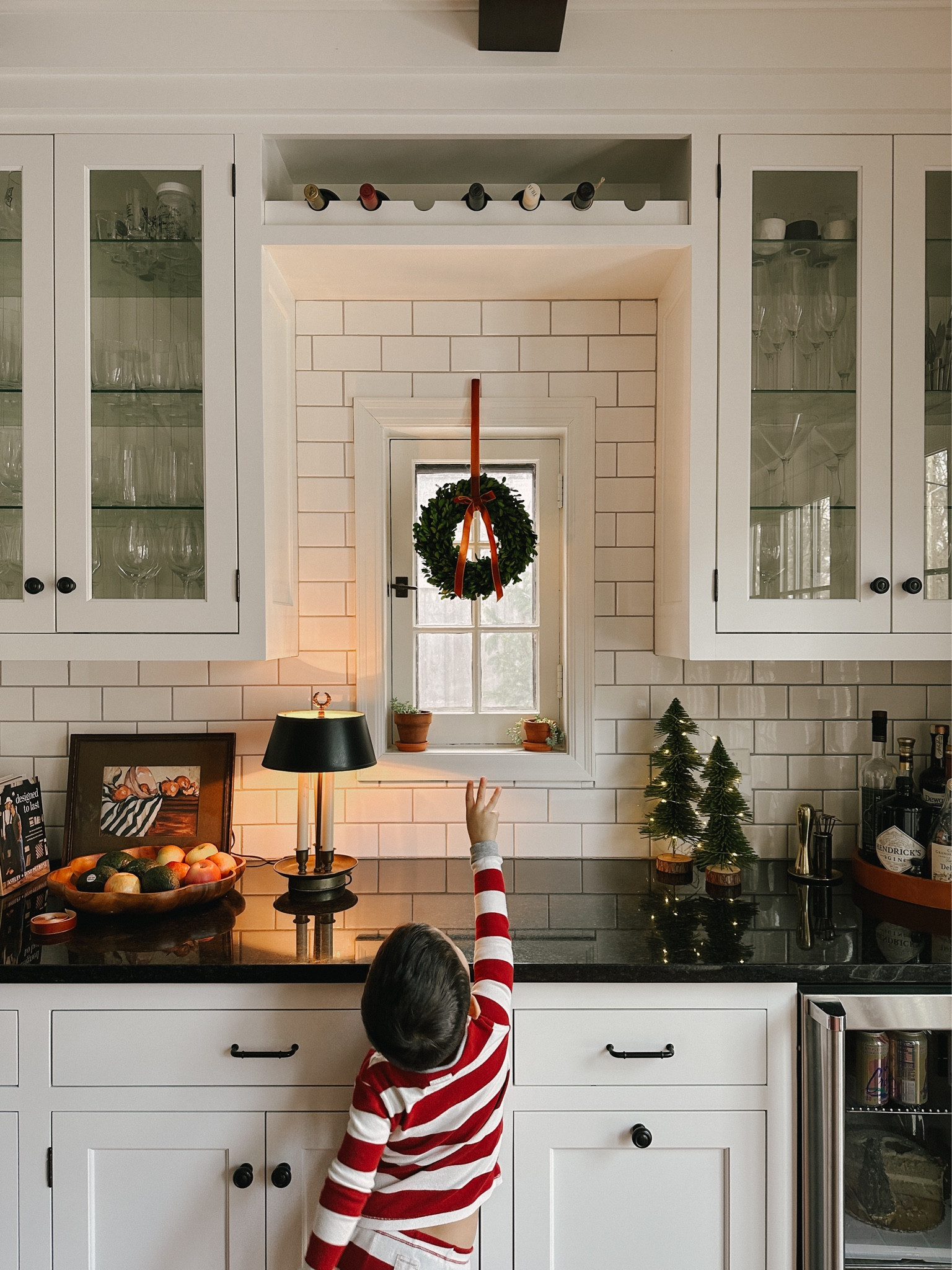 Got this dried boxwood mini wreath about 8 yrs ago that we hang up every year. It’s darling and works great as winter decor, too. I found a similar one and it’s on sale for $15! Tip: keep the packaging to help preserve them so they don’t get smushed/crunched up. *velvet ribbons, christmas bottle brush trees  

#LTKHoliday #LTKstyletip #LTKsalealert
