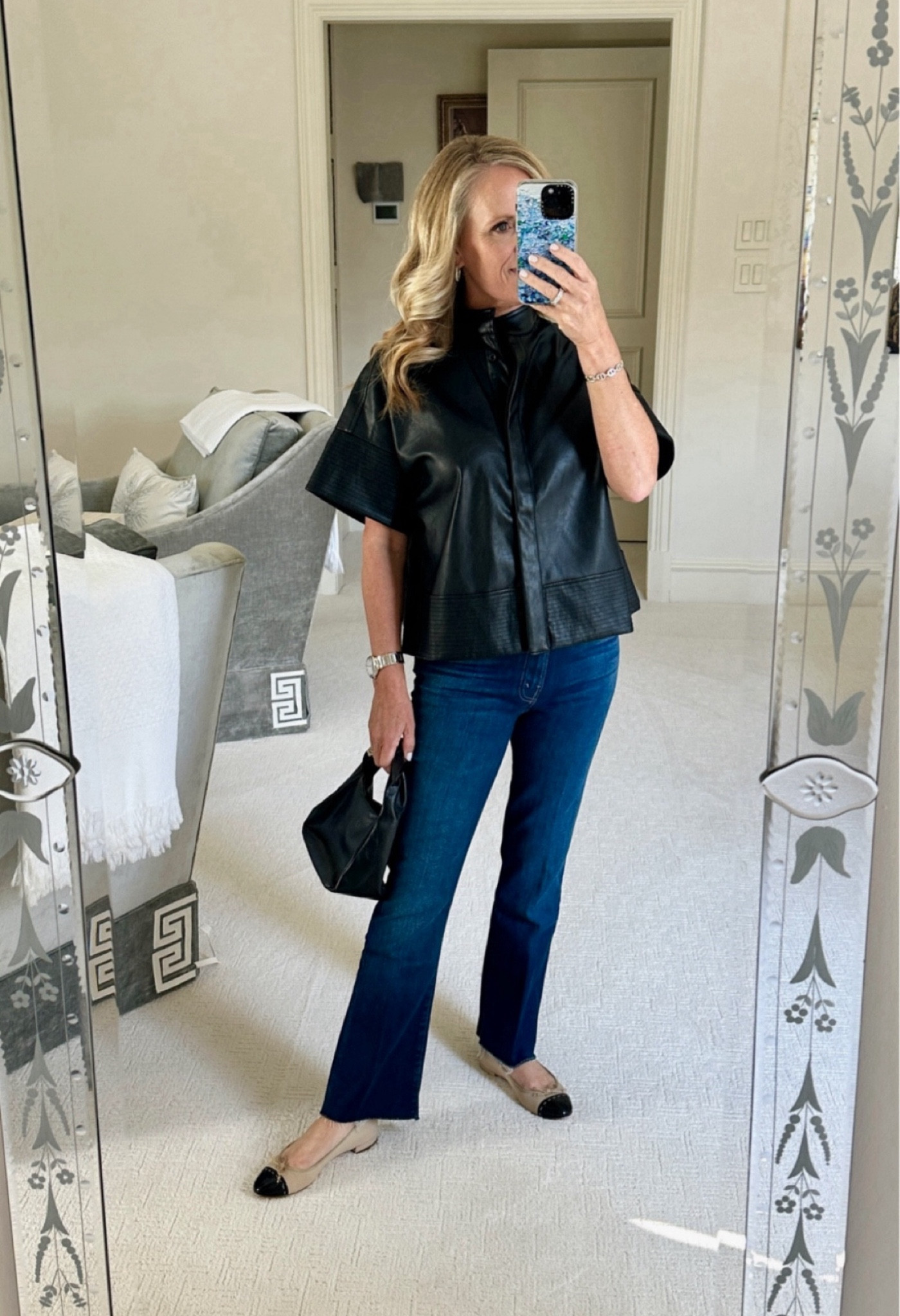 Fall outfit! 

Black leather top 
Mother jeans
Cap toe ballet flat 
Black bow handbag 

Fall transitional outfit


#LTKOver40 #LTKSeasonal #LTKStyleTip