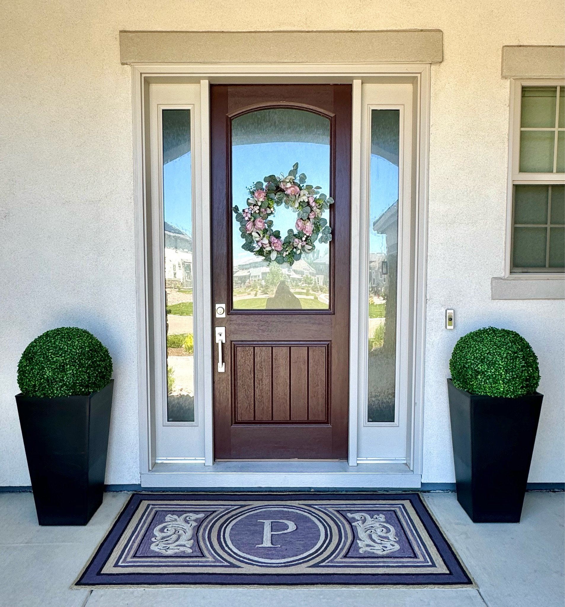 If you’ve been looking for the perfect summer porch decor, my monogrammed porch mat is on sale + free shipping (in 3 sizes and colors) and my favorite large porch planters are under $90 and have a little shelf to prop up real or faux greenery and also a way to drain real plants. 

These are very sturdy and survived many tornado-like winds. I use them year-round to hold everything from boxwoods, potted mums to artificial Christmas trees. These are great for a deck or backyard patio too! Everything linked, except exact wreath was a Homegoods find. 

#ltkhome #porchdecor #planters #curbappeal #planterpots #interiorsesign #decorating 

#LTKSeasonal