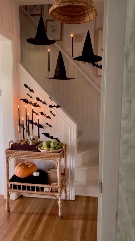 Spooky Halloween bar cart with hanging witch hats, and battery operated taper candles up our stairway creates a fun and spooky scene for our kids 🧡 Serena and Lily, Pottery, Barn, wallpaper, stairway, witch, hats, Halloween, decor, fall, decor, spooky season

#LTKHalloween #LTKhome #LTKSeasonal
