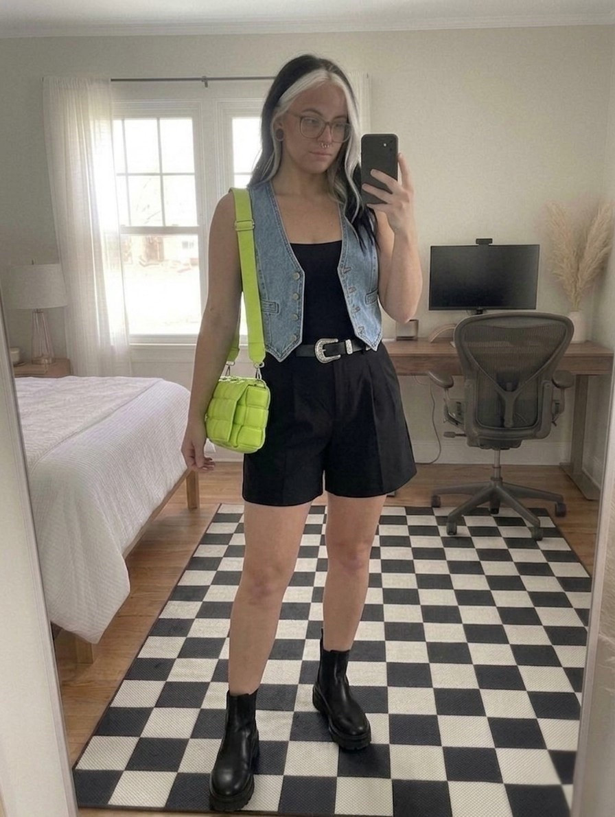 Casual edgy outfit with a pop of color 💚 Black shorts, chunky boots, and a denim vest layered over a bodysuit for an effortless everyday look. The green crossbody adds the perfect statement ✨ #LTKStyle #LTKFinds #CasualOutfit

#LTKootd #LTKSeasonal #LTKMidsize