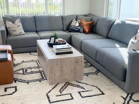 Family room close-up at my client’s home in Orange County 🙌🏻

#ltkhome #sectional #coffeetable #arearug 