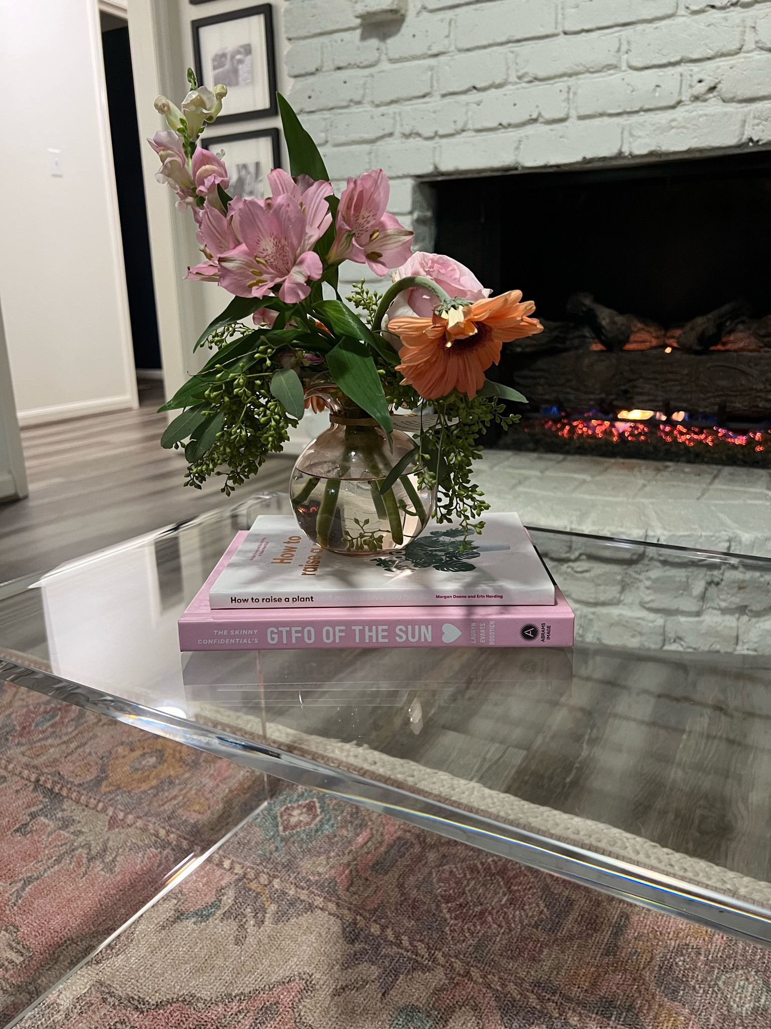 Coffee table decor // spring time inspired - acrylic coffee table is perfect for small spaces! 

#LTKU #LTKSeasonal #LTKhome