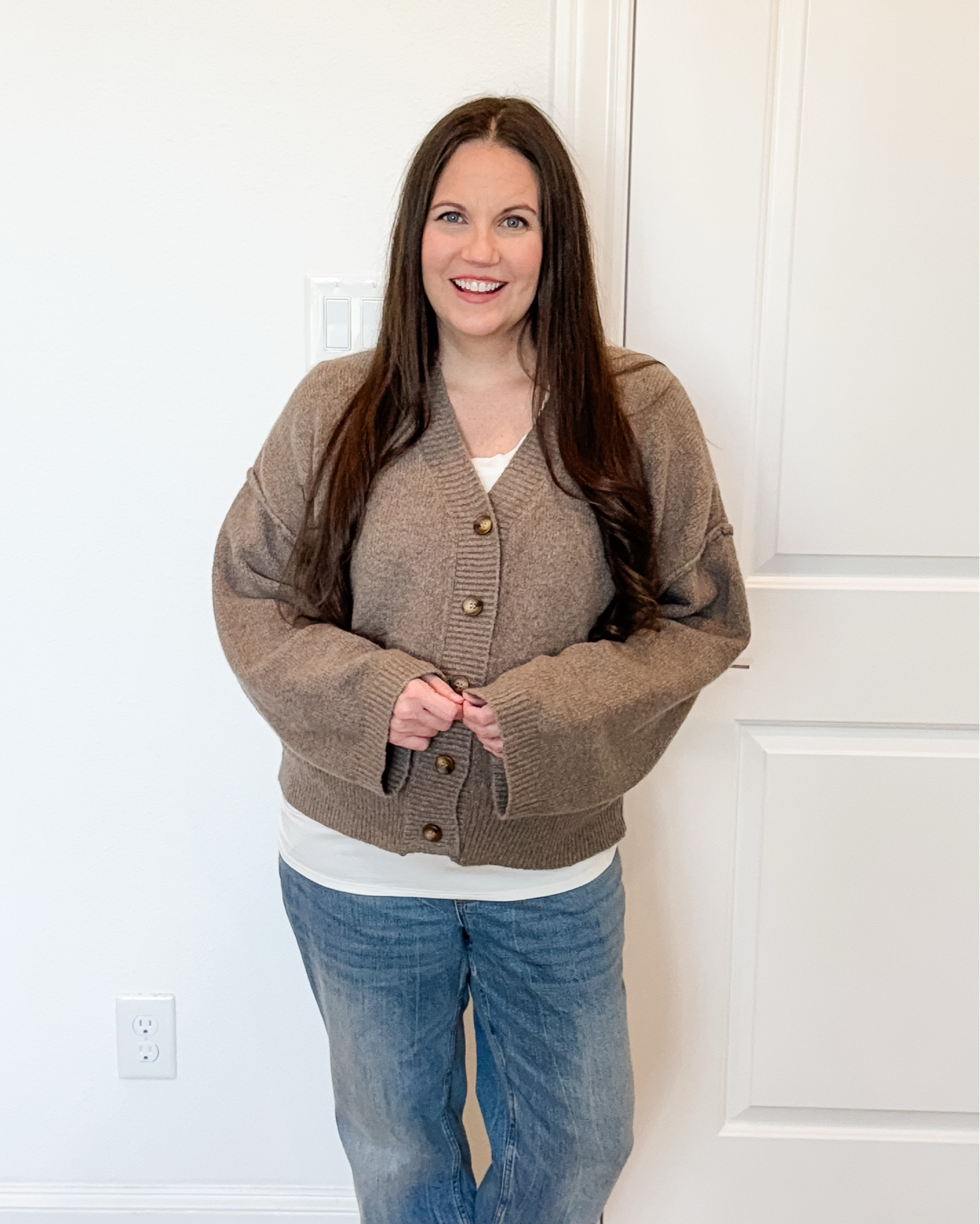 Building out my fall outfit and winter outfit staples with this neutral, bump-friendly look. This light brown cardigan sweater is such an easy layering piece and pairs perfectly with straight leg ankle jeans for a clean, everyday silhouette. I finished the look with light brown booties, but it also works effortlessly with tan boots for colder days.
If you’re searching for polished but comfortable maternity outfits, this one belongs in your winter lookbook, fall and winter lookbook, and everyday winter street style rotation.
The perfect elevated casual outfit for busy days.


#LTKBump #LTKSeasonal #LTKFindsUnder100