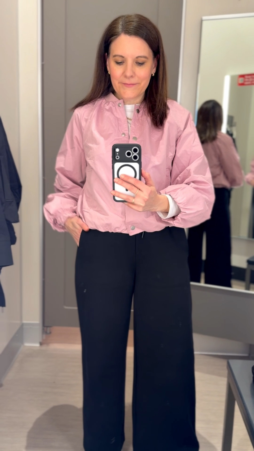 This windbreaker comes in pink and black. I saw a woman wearing the pink one with black wide leg jeans on Valentine’s Day like a completer piece, instead of a cardigan. They are very lightweight and end at the hip bone and close with snaps. I’d love this more if the snaps were easier to close. I found them tricky. Wear them with jeans, pants or dresses.  They fit small, I sized up to a medium. @Target 

#LTKfindsunder50 #LTKover40 #LTKmidsize