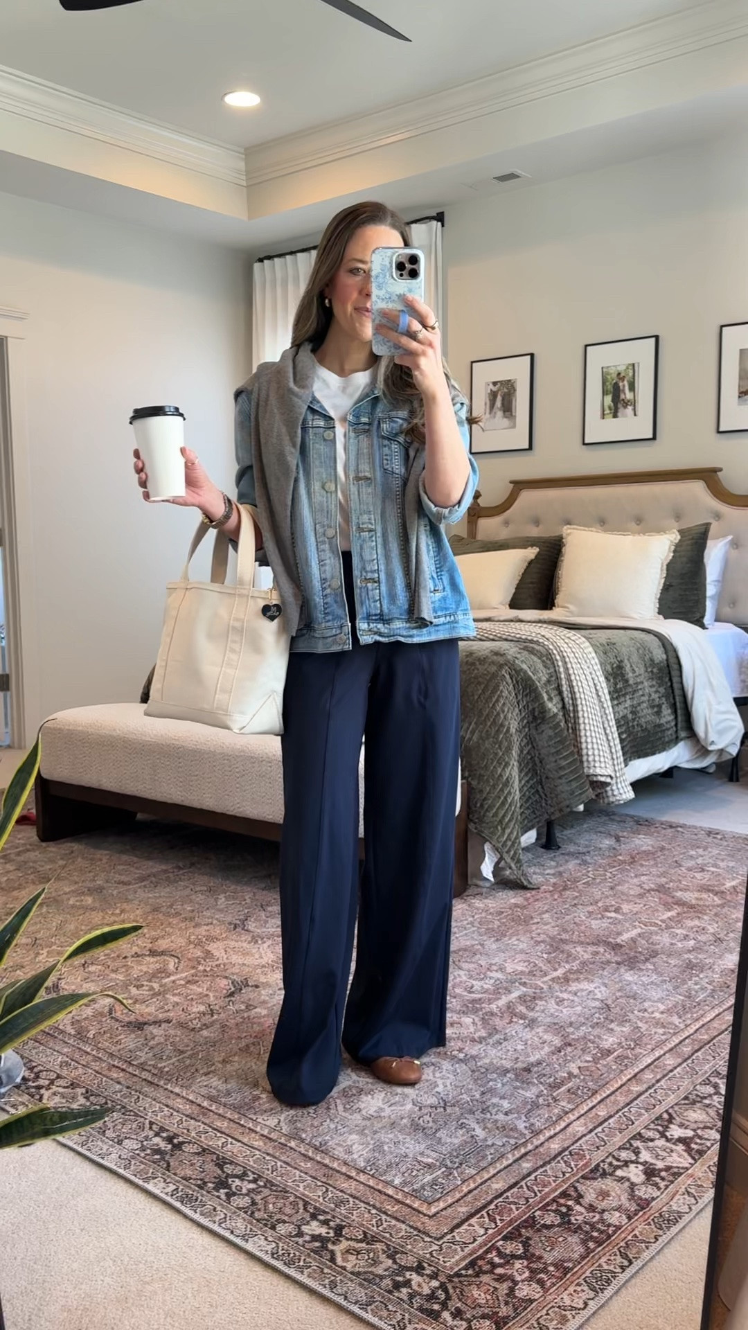 Elevated Casual Mom Outfit 🤍

• Levi’s boyfriend denim jacket
• Target white tee
• Amazon grey sweater (layered over shoulders)
• Old Navy athletic wide leg trousers
• Ralph Lauren brown leather flats

This is one of my favorite “polished but comfortable” outfit formulas.

Structured denim jacket + soft tee + flowy athletic trousers = comfortable enough for busy mom life, but still pulled together.

The sweater over the shoulders adds that classic, intentional layer that makes the whole look feel styled.

Perfect for:
• Casual chic mom outfits
• Athleisure workwear
• Wide leg trouser outfit
• Denim jacket outfit ideas
• School drop-off outfit
• Elevated everyday basics
• Capsule wardrobe mom style

Comfortable. Classic. Repeatable.

#LTKmomlife #LTKSeasonal