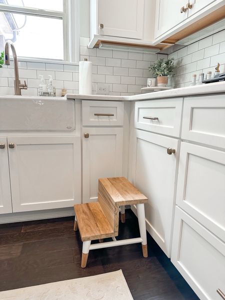 We love this step stool in our kitchen. It makes it easy for Josie to wash her hands and to access the upper cabinets  