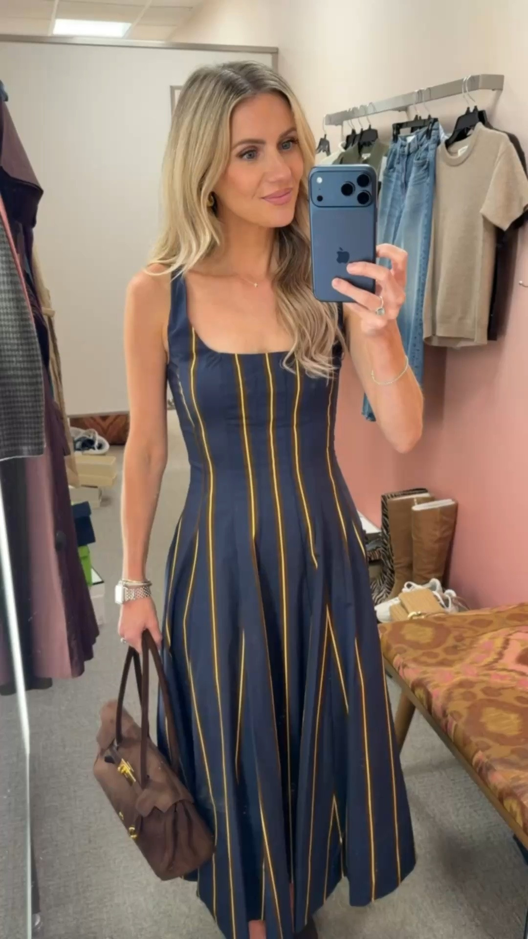 This navy striped dress feels classic with just the right amount of structure. I styled it with brown heels and a chocolate suede bag for a polished look that’s perfect for weddings, dinner, or special events. It’s one of my favorite dress finds from the Nordstrom Anniversary Sale.

#LTKgrwm #LTKootd #LTKSaleAlert