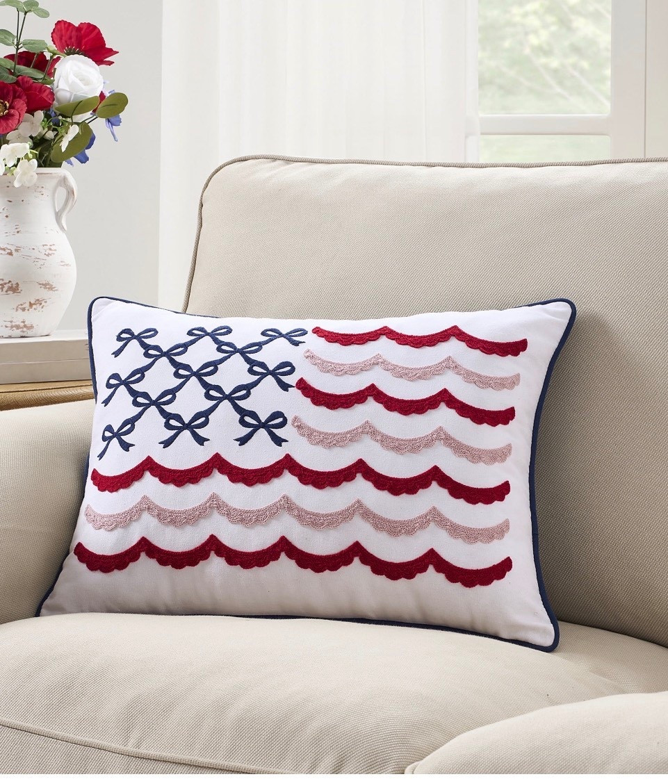 Seasonal decorating becomes more fun with the My Texas House Bow Flag Decorative Pillow, a colorful accent inspired by classic red, white, and blue motifs. This 19.5-inch by 14-inch pillow features embroidered bows and scalloped stripes arranged in a charming flag-inspired design that fits beautifully on sofas, chairs, benches, or porch seating. The bold stitching adds texture and interest, while the soft fabric cover helps create an inviting spot to relax during summer gatherings or quiet evenings at home. Its size makes it easy to pair with larger pillows or display on its own as a standout piece. Whether used indoors or styled on a covered outdoor space, the My Texas House Bow Flag Decorative Pillow brings a cheerful touch to your seasonal decor

#LTKSeasonal #LTKHome #LTKmorningroutine