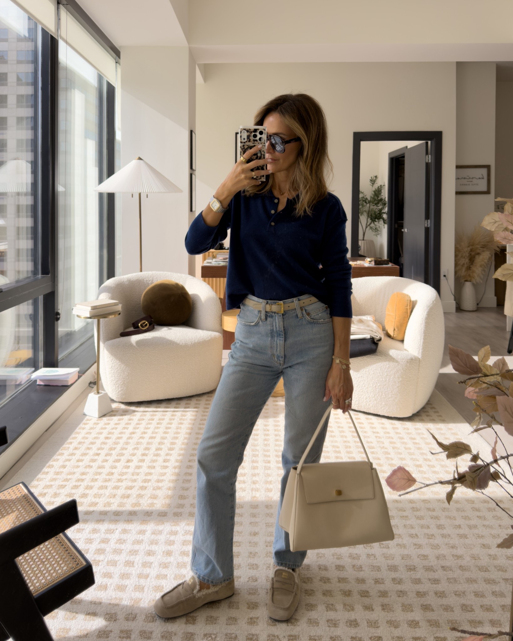 What I’m wearing to the office today! 
My jeans are the 90s pinch waist size 25 and cashmere polo sweater size small 
Shearling mi uniu shoes (can’t stop wearing!) and new bag I also can’t stop carrying! Amazon sunnies 

#LTKItBag #LTKShoeCrush #LTKootd