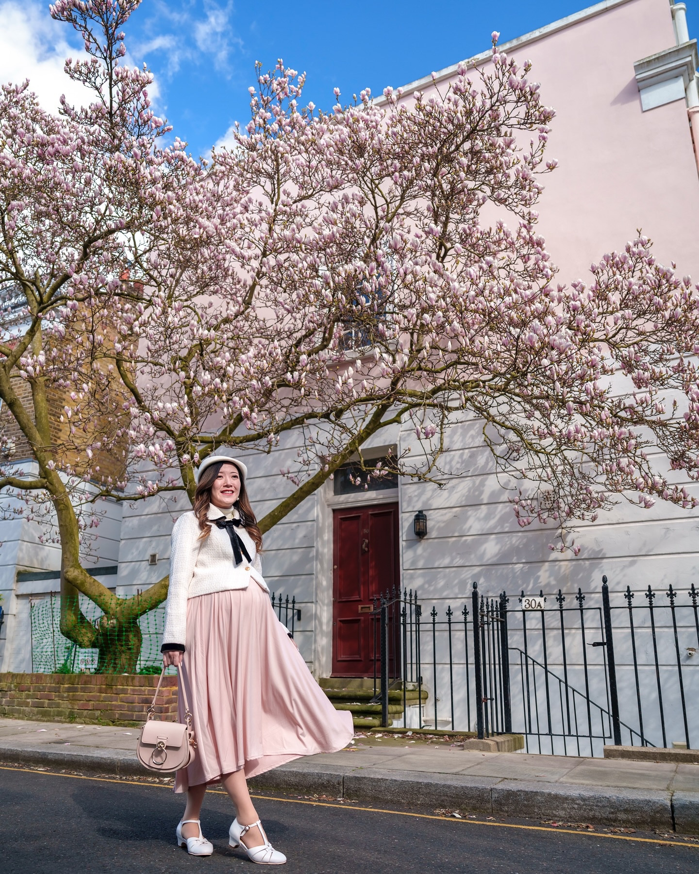 Pink magic in Chelsea🌸

I’m so happy that Magnolia has started to bloom in London! We’ve visited Bramerton Street for the last 2 weeks to chase the blooming flowers. I can’t stop smiling to see the beauty of the blooming Magnolia last weekend🌸🥰 I expect Magnolia will be in full bloom now. Don’t miss the chance to see this pink magical moment🌸 

Which photo is your favourite? 🌸

I’m also obsessed with this outfit I wore in my reel earlier. The Flossy blazer and pink midi dress combo perfectly complements this pink backdrop💗

Outfit details🎀
Blazer and turtleneck: @flossybyfreddy in size XXS - runs large, I could still wear it in my third trimester🥰

Midi: @hm 
Shoes (*ad/hr) : @charliestoneshoes 
(Coupon code for 10% off: PETITEALPACA10)

Save this post & follow @petitealpaca for more dreamy travel and feminine fashion content.

📸 shot and edited by: @capturewithvic @vimage.pro @sony.unitedkingdom @alphauniversebysony.eu @adobeuk 
PM us if you’d like to hire us for photography in London💕

📍Bramerton Street, London, UK, 16th March 2025

#londoninspring #springinlondon #chelseainspring #springinchelsea #springtimeinlondon #pregnancyphotography #maternityphotography #pregnancyshooting #pregnancyshoot #thebump #babybump #maternityphotographylondon #mamatobe #mumtobe #themotherhoodanthology #pregnancyphotoshoot #thirdtrimester #pregnancy #preggo #motherhoodjourney #modernprincess #princesscore  #princessaesthetic 
#londonfashionblogger  #dreamyaesthetic 
#femininestyle #classyfashion #classygirl #girlyaesthetic 

🗝️ London in Spring, Flossy, Pregnancy shoot, pregnancy journey, pregnancy photoshoot, pregnancy photography, pregnancy bump, baby bump, Feminine elegant classy style, modern princess, maternity shoot maxi dress

#LTKuk #LTKworkwear #LTKmaternity