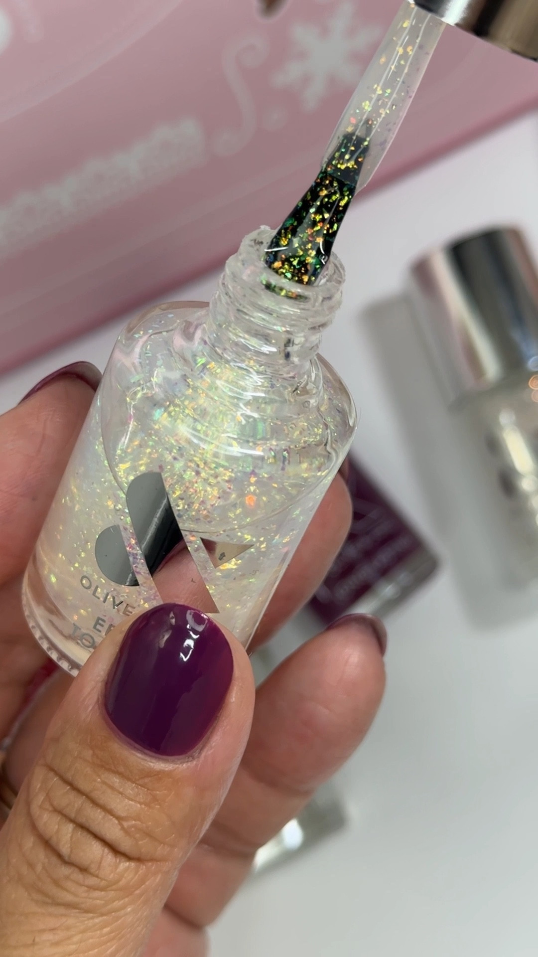 This sparkly holo flake topper completely changes the look of any mani! I love to use over darker shades for a more noticeable contrast!! 

Polish: Who Likes Raisins? + The Stardust Effect 

You can save 20% off your first system at Olive & June with code illysmani20 

The system includes everything you need to do your mani at home, it is the perfect gift for the mani lover in your life!

#LTKGiftGuide #LTKBeauty #LTKHoliday