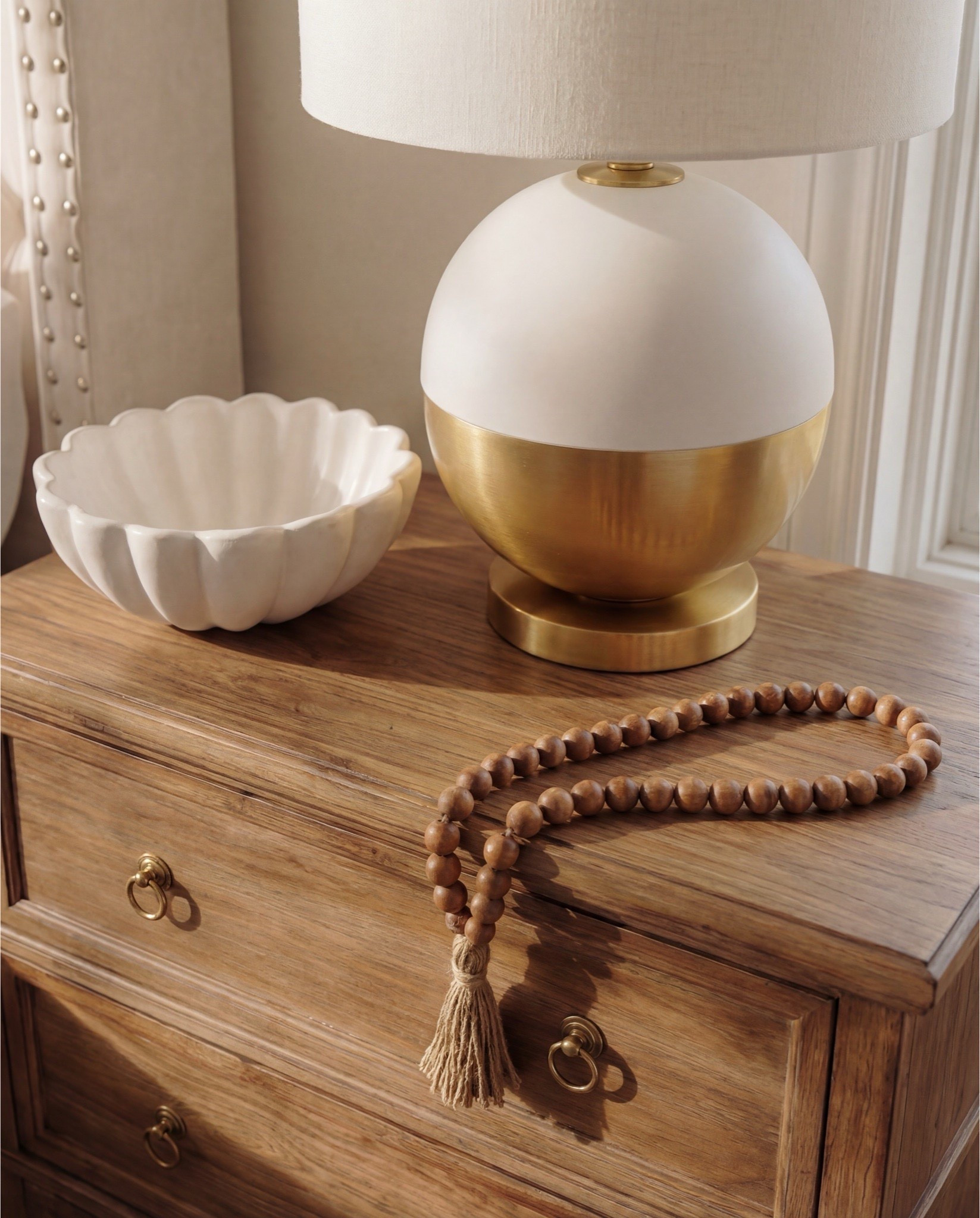 Shop the Look: Bedroom Refresh
• Upholstered tufted bed (cream or ivory)
• Neutral upholstered bench or bed frame base
• Wooden nightstands (medium warm wood)
• Table lamps (white shade, brass base)
• White bedding (duvet + sheets)
• Brown textured throw blanket
• Neutral accent pillows (tan or camel)
• Framed floral artwork (warm brown tones)
• Quilted round ottomans (cream)
• Brass ottoman bases
• Vintage-style area rug (neutral pattern)
• Exposed wood ceiling beams
• Decorative bowl or small tray on nightstand
•wood decor beads#LTKFindsUnder100



#LTKHome #LTKSaleAlert