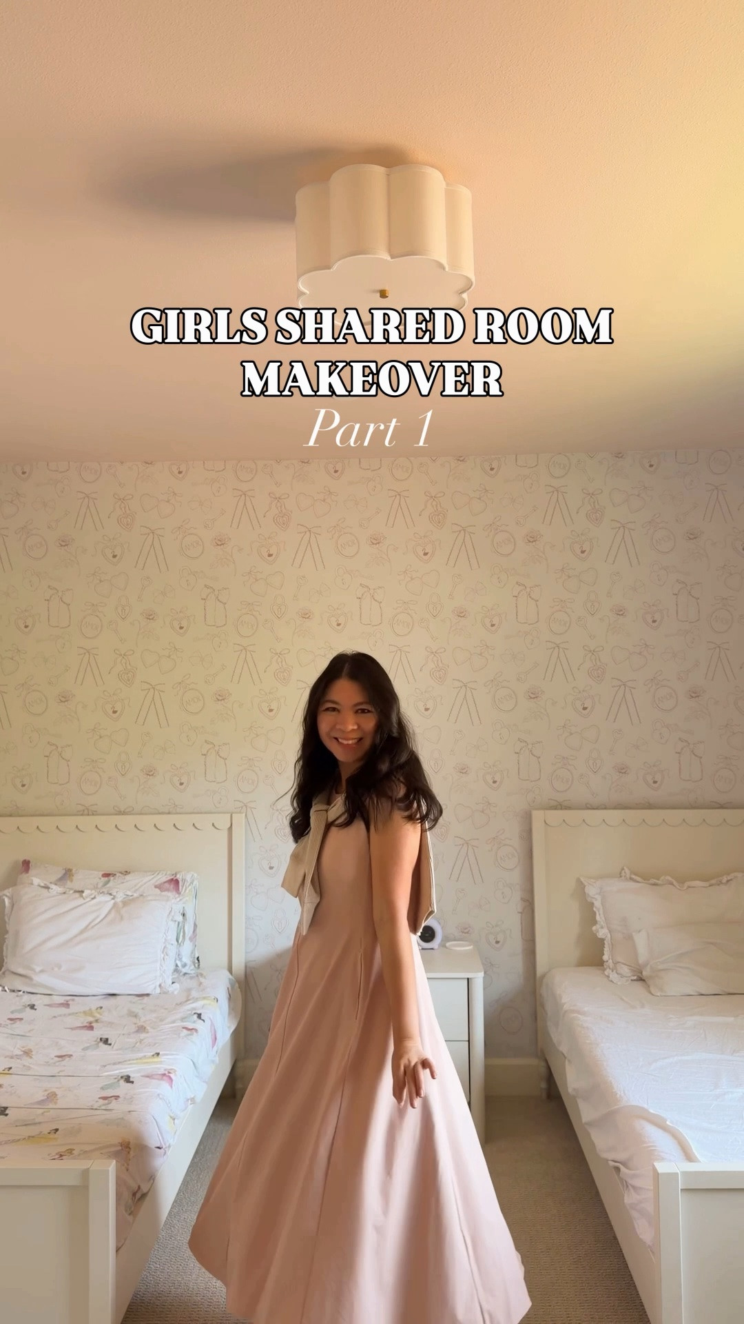 Toddler girls shared room makeover with new paint, wallpaper, scallop furniture, Penny twin beds, ceiling light, scallop nightstand, and bow mirror

#LTKHome #LTKKids