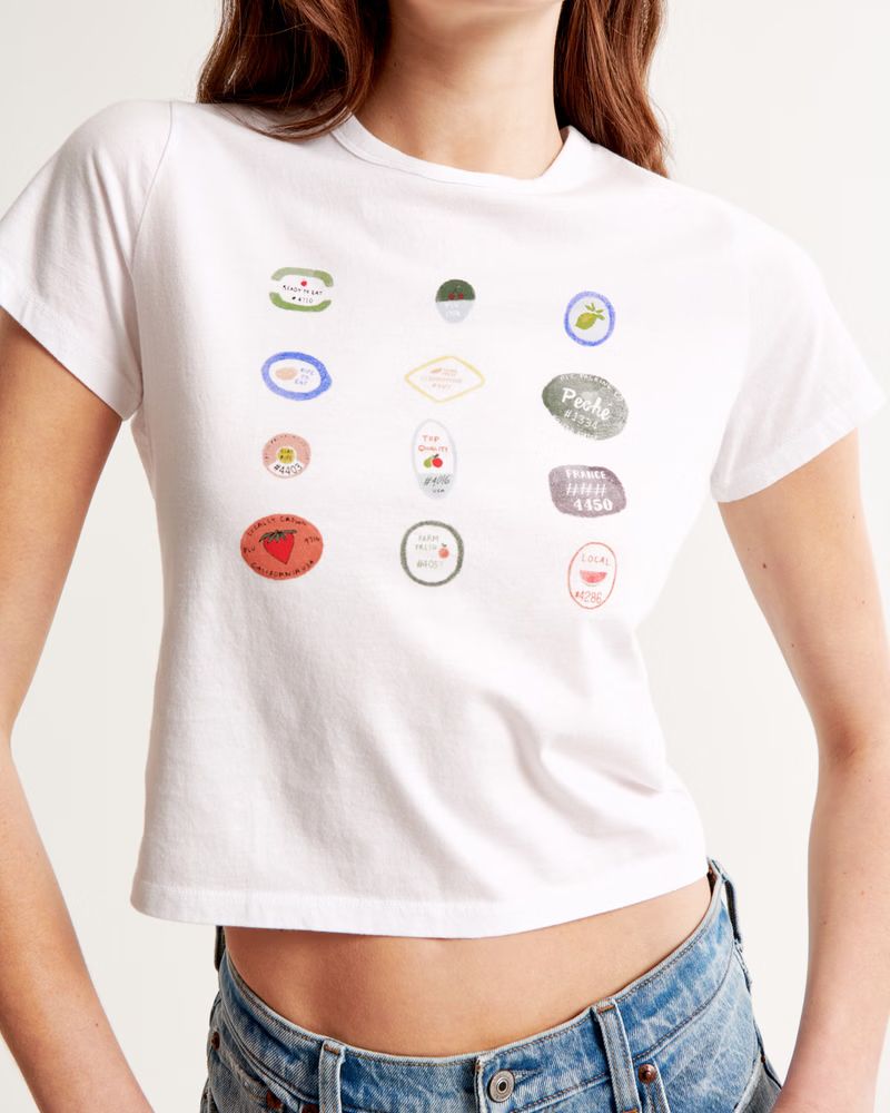 Women's Short-Sleeve Stickers Graphic Skimming Tee | Women's New Arrivals | Abercrombie.com | Abercrombie & Fitch (US)