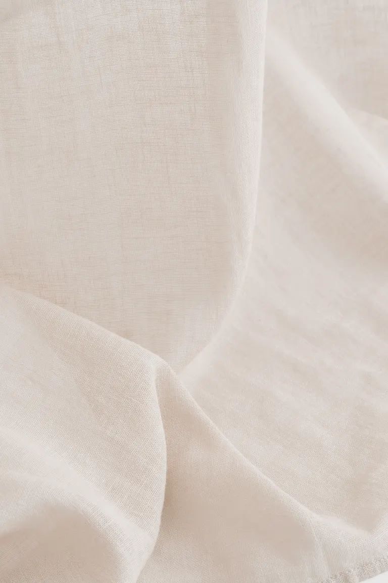 Two extra-long curtain panels in a woven linen and cotton blend. Multiway header for four differe... | H&M (US + CA)