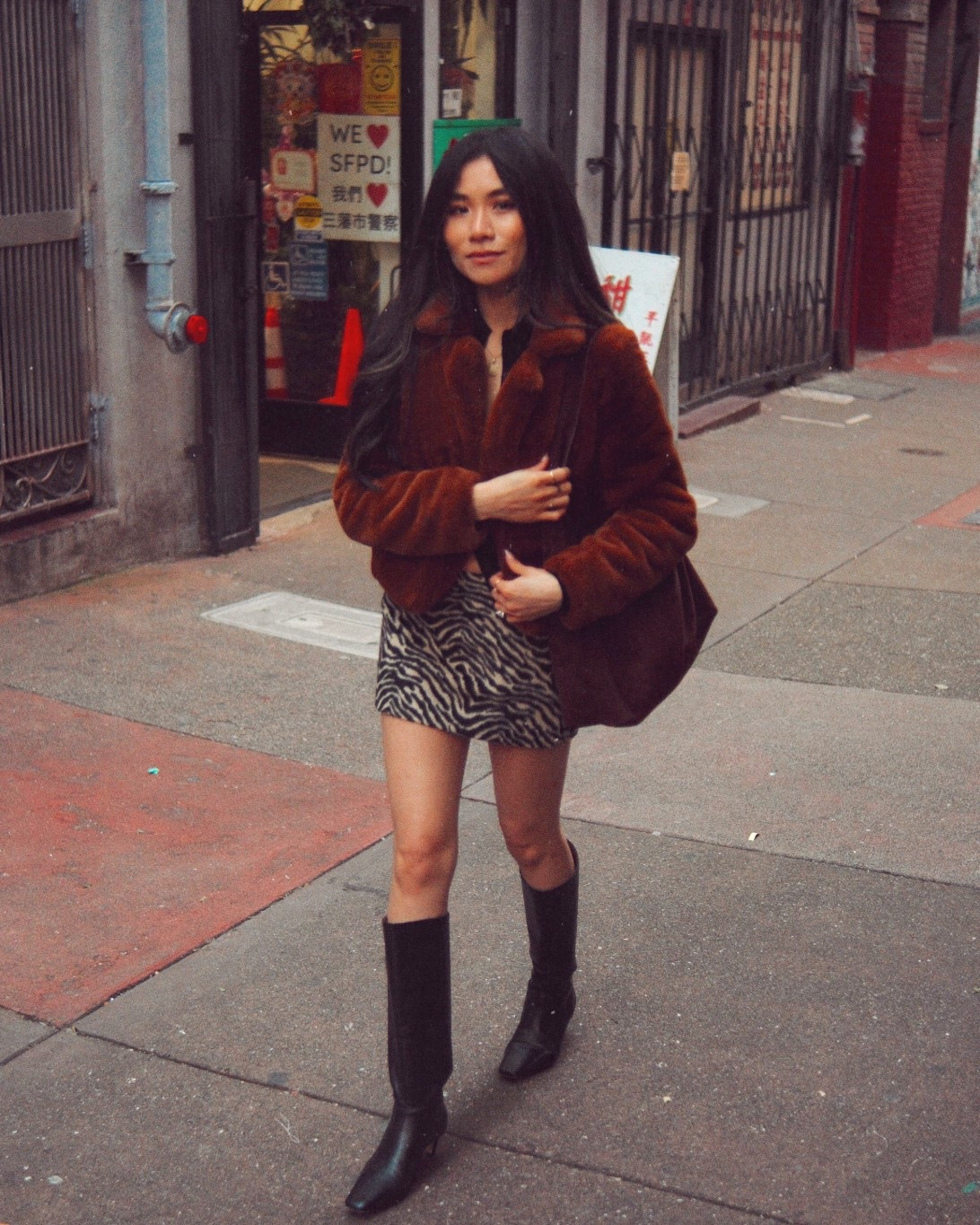 Cute street style outfit: zebra hair mini skirt + black tall boots + faux fur jacket

Boots: TTS
Skirt: 0

#LTKdayinmylife #LTKPetite #LTKTravel